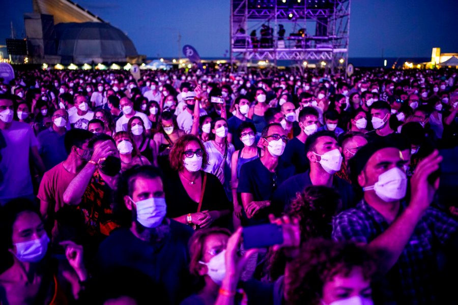 People attend the Cruilla music festival in Barcelona, Spain, Friday, July 9, 2021. (AP Photo/Joan Mateu)