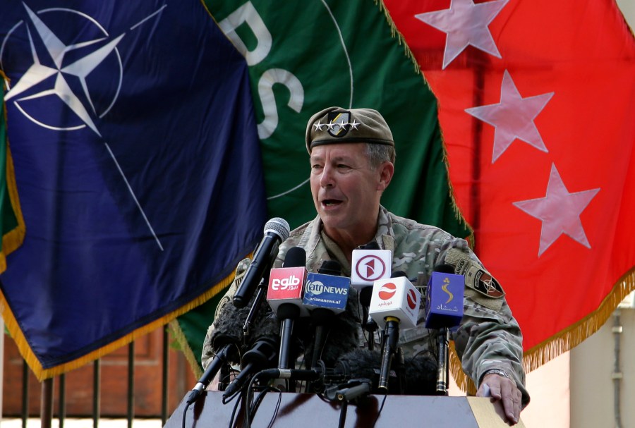 U.S. Army Gen. Scott Miller, the top U.S. commander in Afghanistan, speaks at a ceremony where he relinquished his command, at Resolute Support headquarters, in Kabul, Afghanistan, Monday, July 12, 2021. The United States is a step closer to ending a 20-year military presence that became known as its "forever war," as Taliban insurgents continue to gain territory across the country. (AP Photo/Ahmad Seir)