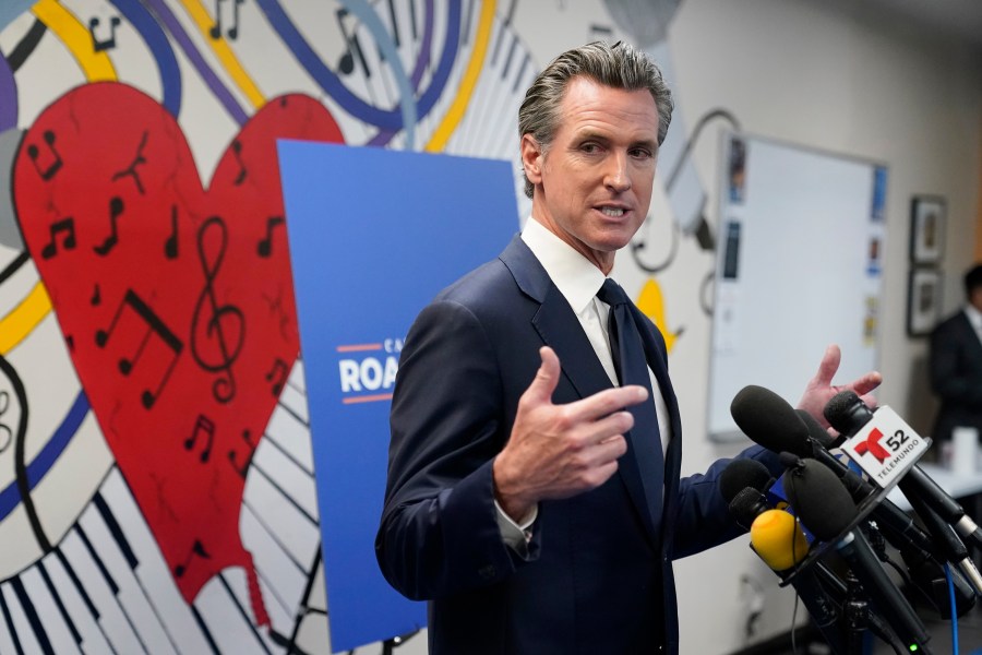 California Gov. Gavin Newsom fields questions after a rally where he signed the California Comeback Plan relief bill Tuesday, July 13, 2021, in Los Angeles. (AP Photo/Marcio Jose Sanchez)