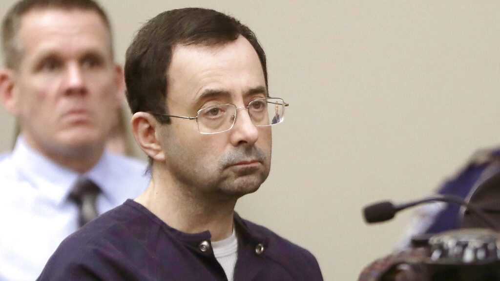 Larry Nassar, a former doctor for USA Gymnastics and member of Michigan State's sports medicine staff, sits in court during his sentencing hearing in Lansing, Mich., on Jan. 24, 2018. (Carlos Osorio / Associated Press)