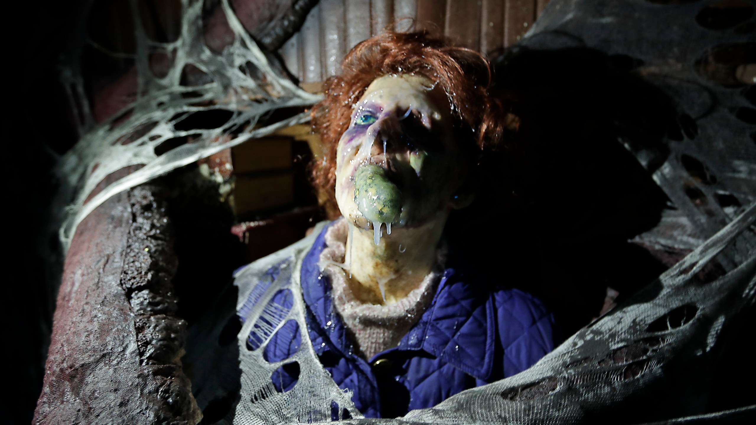 In this Sept. 12, 2018 file photo, the character Barb appears in grand, gory style in the Stranger Things haunted house during Halloween Horror nights at Universal Studios in Orlando, Fla. After a pandemic-related absence of a year, Halloween Horror Nights are back with haunted houses based on the “Texas Chainsaw Massacre” and “The Bride of Frankenstein" planned for Universal theme parks in California and Florida, the company announced Thursday, July 15, 2021. (AP Photo/John Raoux, File)