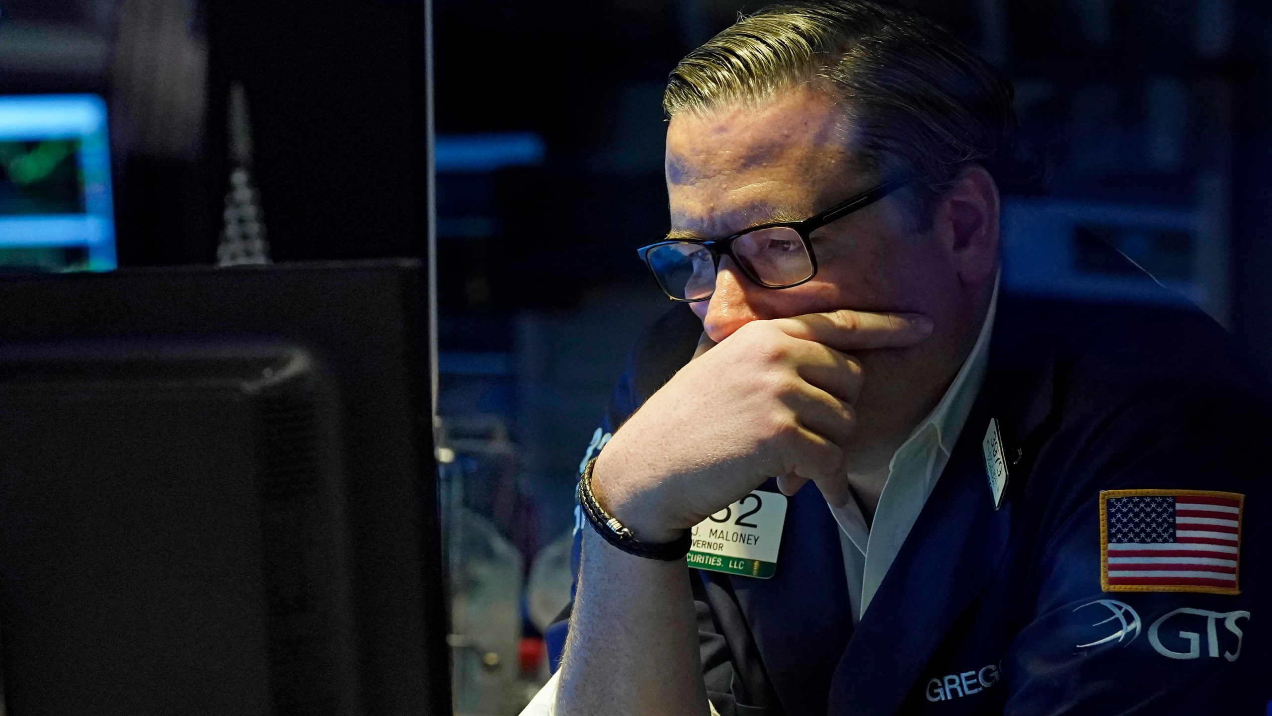 Specialist Gregg Maloney works on the floor of the New York Stock Exchange, Monday, July 19, 2021. Stocks are falling sharply Monday as worries sweep from Wall Street to Sydney that the worsening pandemic in hotspots around the world will derail what's been a strong economic recovery. (AP Photo/Richard Drew)