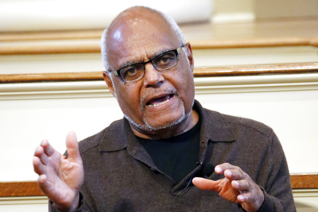 In this Feb. 5, 2014 file photo shows Robert "Bob" Moses, a director of the Mississippi Summer Project and organizer for the Student Non-Violent Coordinating Committee (SNCC) answers questions about Freedom Summer in 1964 during a national youth summit hosted by the Smithsonian's National Museum of American History, at the Old Capitol Museum in Jackson, Miss. Moses, a civil rights activist who endured beatings and jail while leading Black voter registration drives in the American South during the 1960s and later helped improve minority education in math, died Sunday, July 25, 2021, in Hollywood, Fla. He was 86. (AP Photo/Rogelio V. Solis, File)