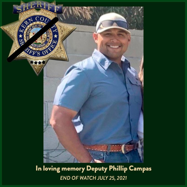 This undated memorial poster Courtesy of the Campas Family/Kern County Sheriff's Office posted on twitter shows Deputy Phillip Campas who was shot and killed on Sunday, July 25, 2021, at a residence in Wasco, Calif. The California sheriff's deputy was fatally shot this weekend when his SWAT team tried to rescue people held hostage inside a San Joaquin Valley home by a man armed with an AK-47-style rifle and a handgun, authorities said Monday. (Courtesy Campas Family/Kern County Sheriff's Office via AP)