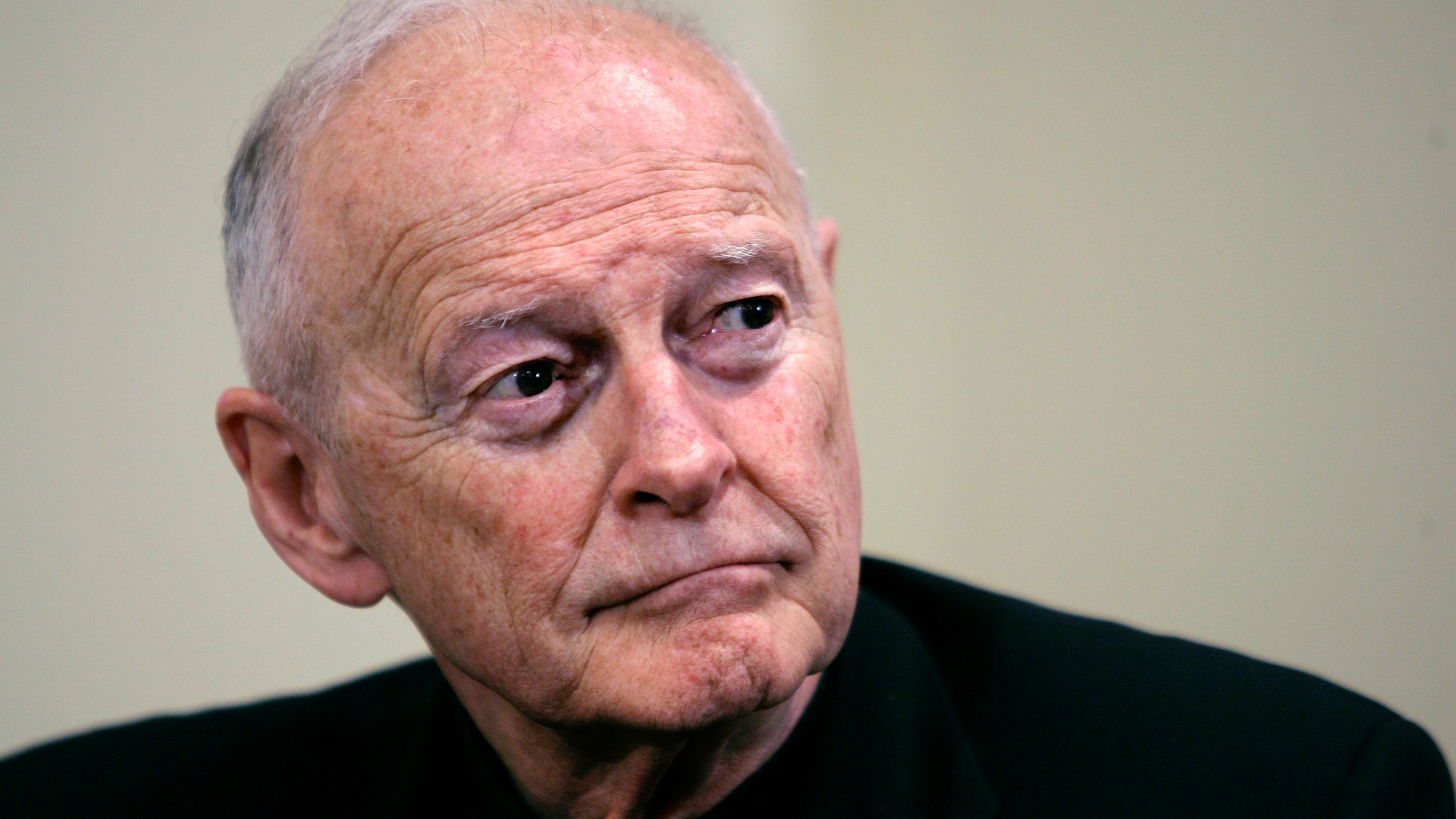 In this May 16, 2006 file photo former Washington Archbishop, Cardinal Theodore McCarrick pauses during a press conference in Washington. McCarrick, the once-influential American cardinal who was defrocked after a Vatican investigation confirmed he had sexually molested adults as well as children, has been charged with sexually assaulting a 16-year-old boy during a wedding reception at Wellesley College in the 1970s, court records show. (AP Photo/J. Scott Applewhite, File)