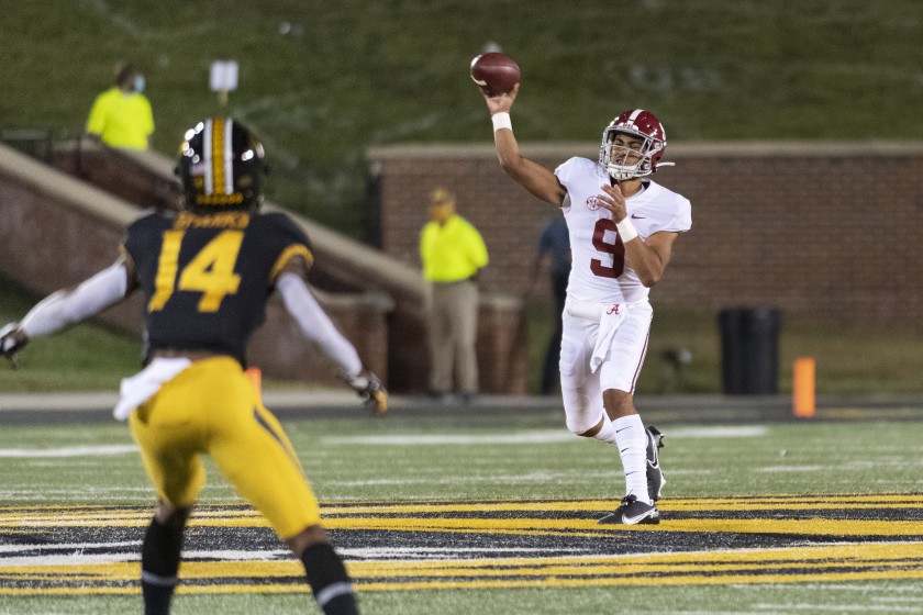 Alabama quarterback Bryce Young, shown on Sept. 26, 2020, is cashing in as young athletes are allowed to profit from their name, image and likeness. (L.G. Patterson / Associated Press)