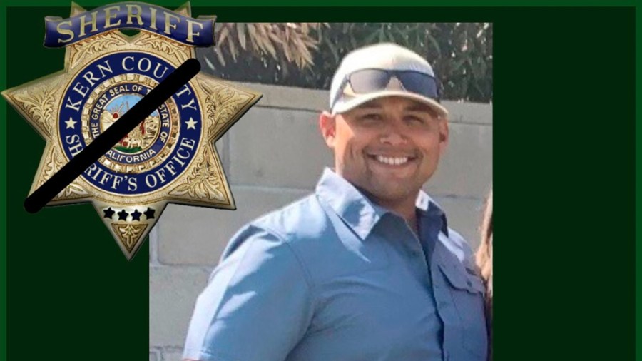 This undated memorial poster Courtesy of the Campas Family/Kern County Sheriff's Office posted on twitter shows Deputy Phillip Campas who was shot and killed on Sunday, July 25, 2021, at a residence in Wasco, Calif. The California sheriff's deputy was fatally shot this weekend when his SWAT team tried to rescue people held hostage inside a San Joaquin Valley home by a man armed with an AK-47-style rifle and a handgun, authorities said Monday. (Courtesy Campas Family/Kern County Sheriff's Office via AP)