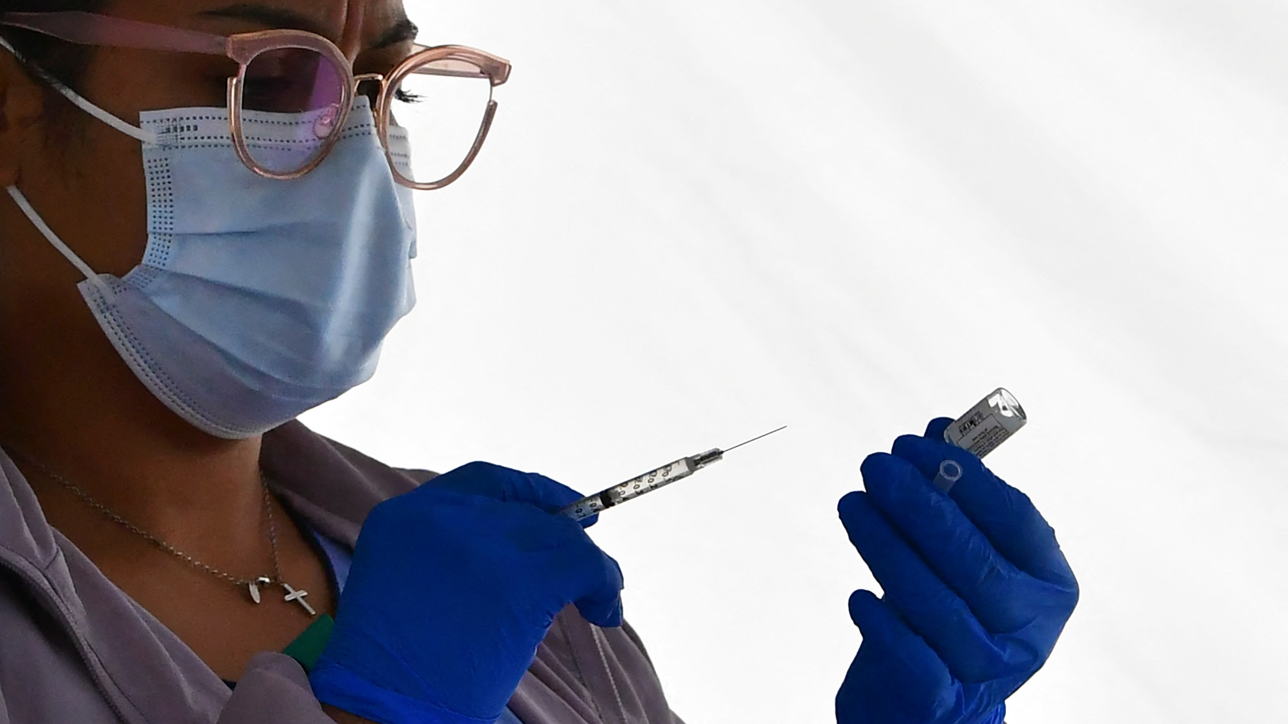 Licensed vocational nurse Denise Saldan prepares the single-dose Johnson & Johnson COVID-19 vaccine in Los Angeles, California on March 25, 2021. (FREDERIC J. BROWN/AFP via Getty Images)