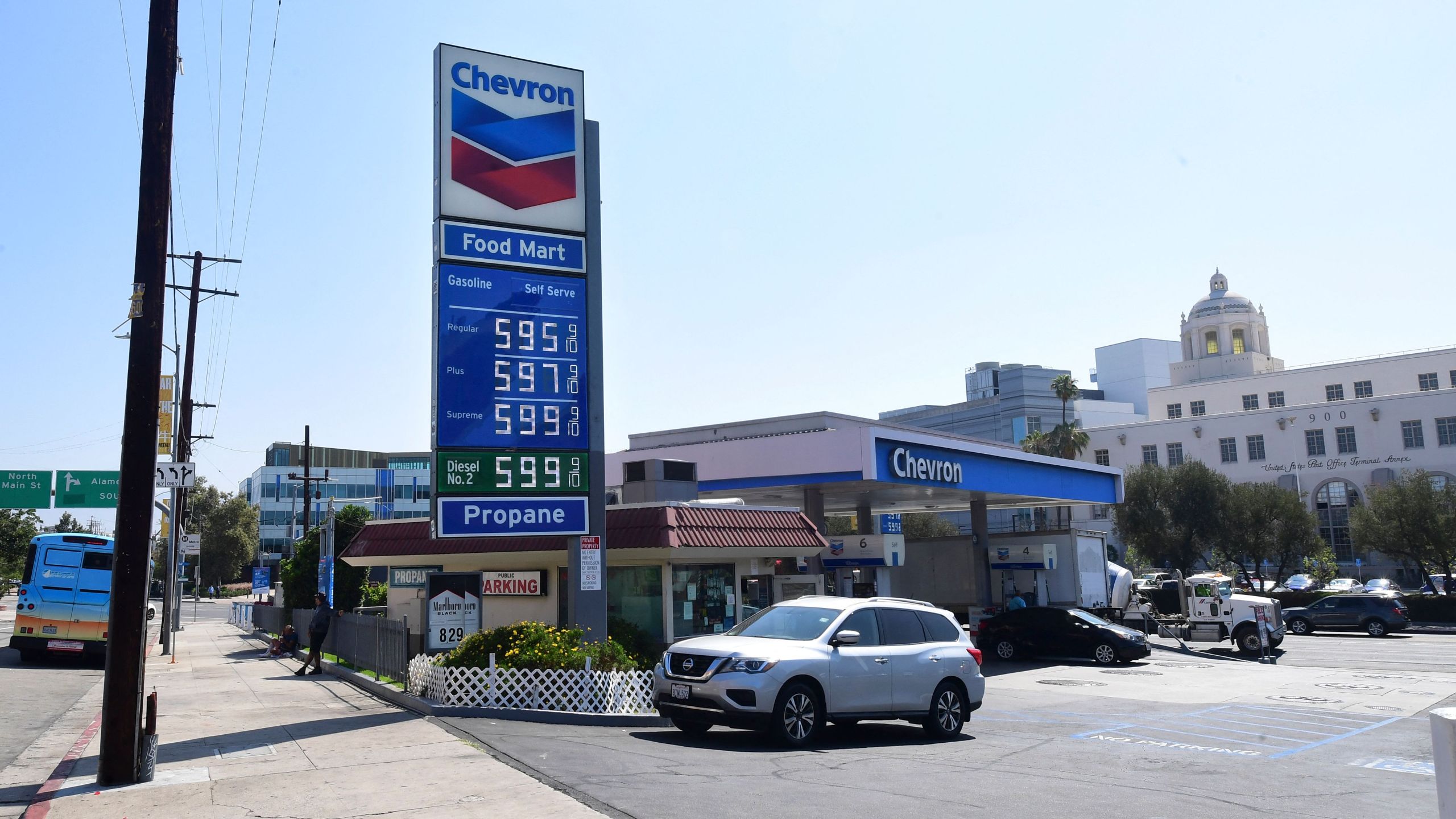 Some of the highest gas prices in town are posted on a signboard at a gas station in downtown Los Angeles, California on June 22, 2021, as gasoline prices rise. (Frederic J. Brown via Getty Images)