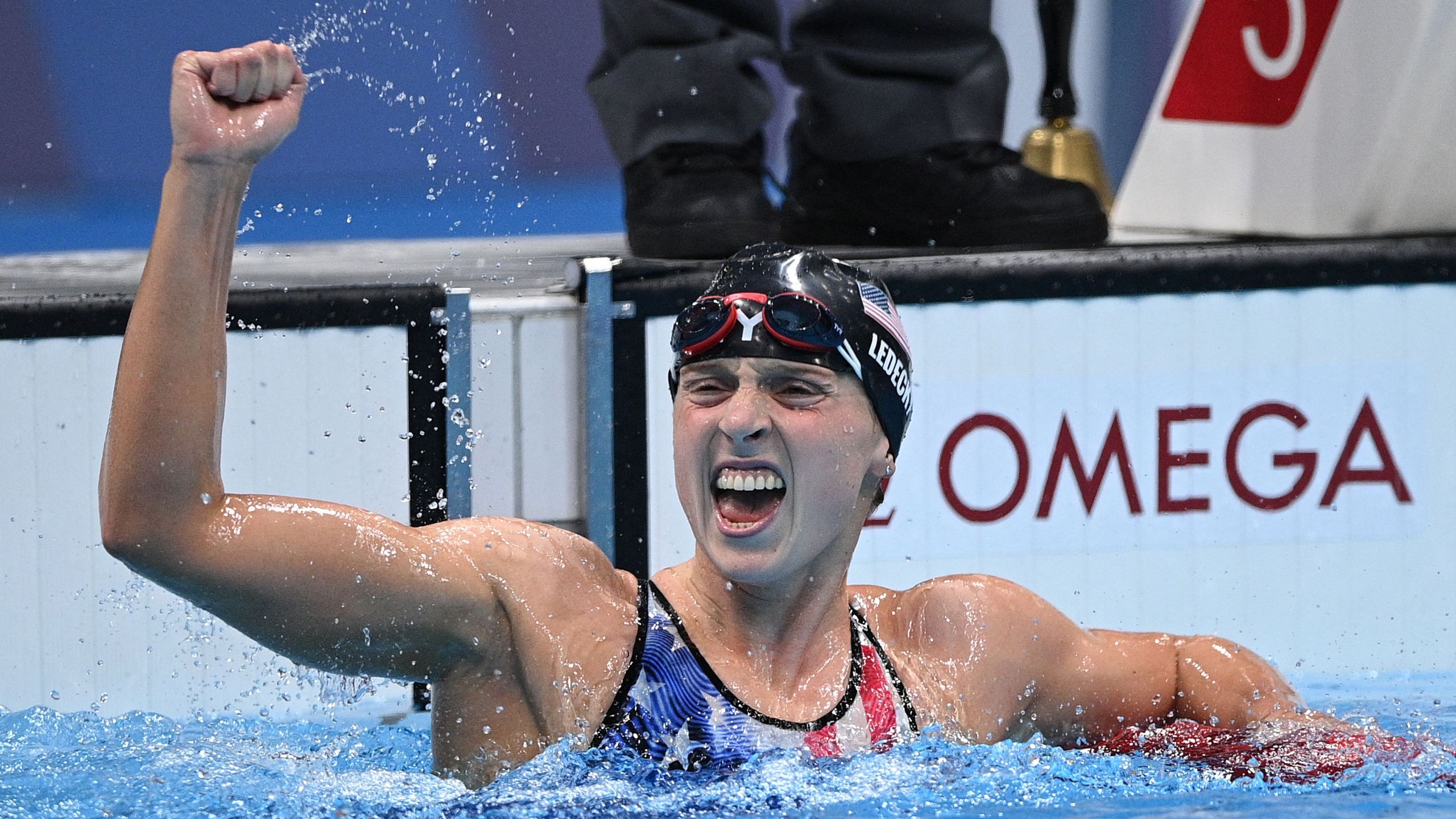 Team USA's Katie Ledecky celebrates after winning the final of the women's 1500m freestyle swimming event during the Tokyo 2020 Olympic Games at the Tokyo Aquatics Centre on July 28, 2021. (Oli Scarff / AFP / Getty Images)