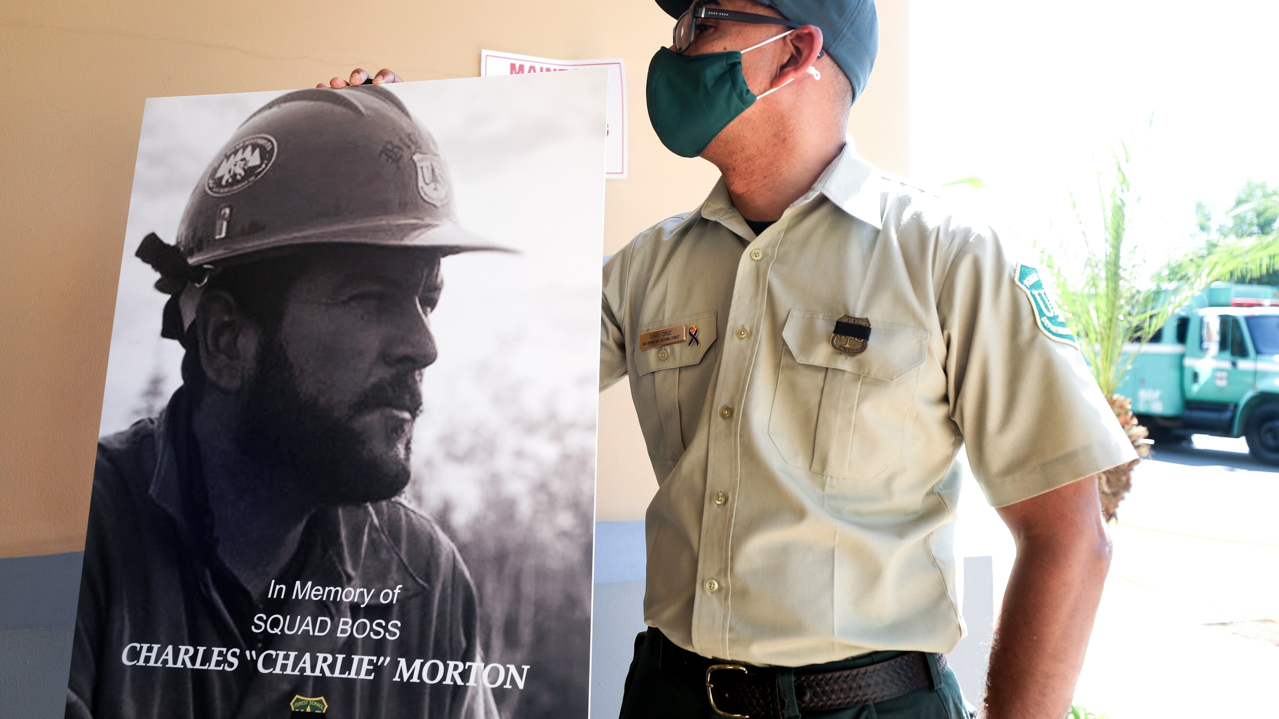 A photograph of fallen Big Bear Interagency Hotshot Charles Morton, a firefighter who was killed battling the El Dorado wildfire, is displayed at a memorial service for Morton on Sept. 25, 2020 in San Bernardino. (Mario Tama / Getty Images)