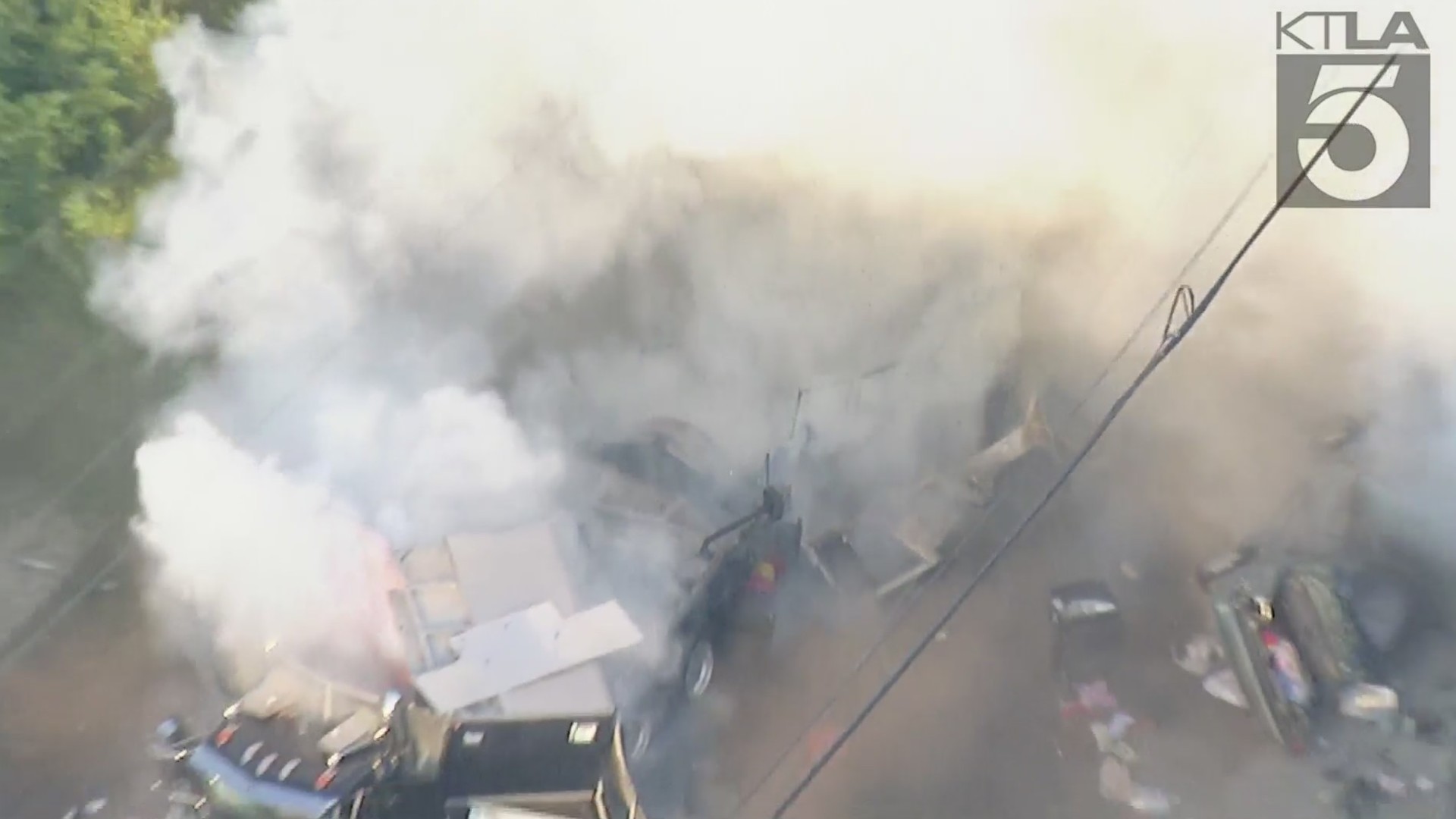 An LAPD tractor-trailer loaded with fireworks exploded in South Los Angeles on June 30, 2021. (KTLA)