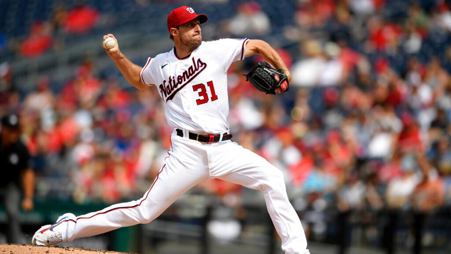 Washington Nationals starter Max Scherzer delivers a pitch during the third inning of the team's baseball game against the San Diego Padres, Sunday, July 18, 2021, in Washington. (AP Photo/Nick Wass)