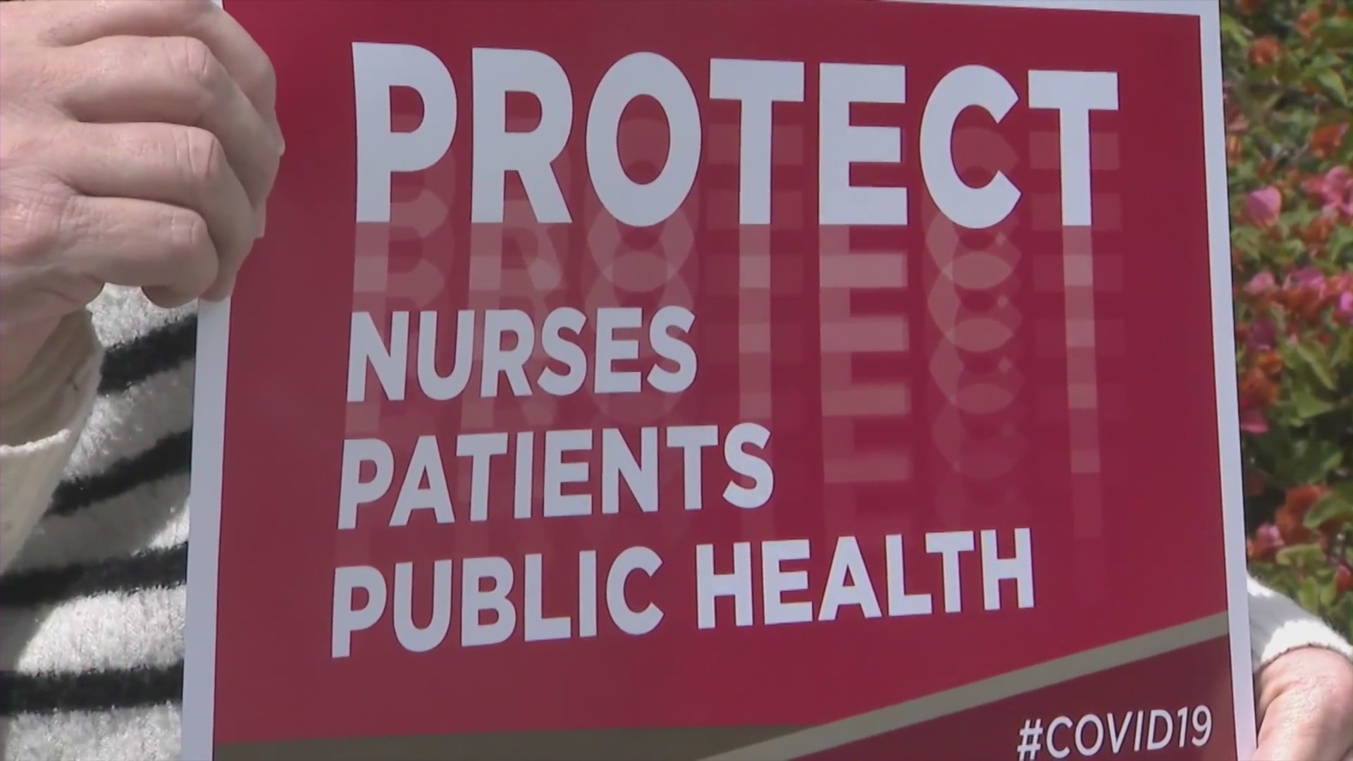 A sign is seen during a nurses protest in this file photo. (KTLA)