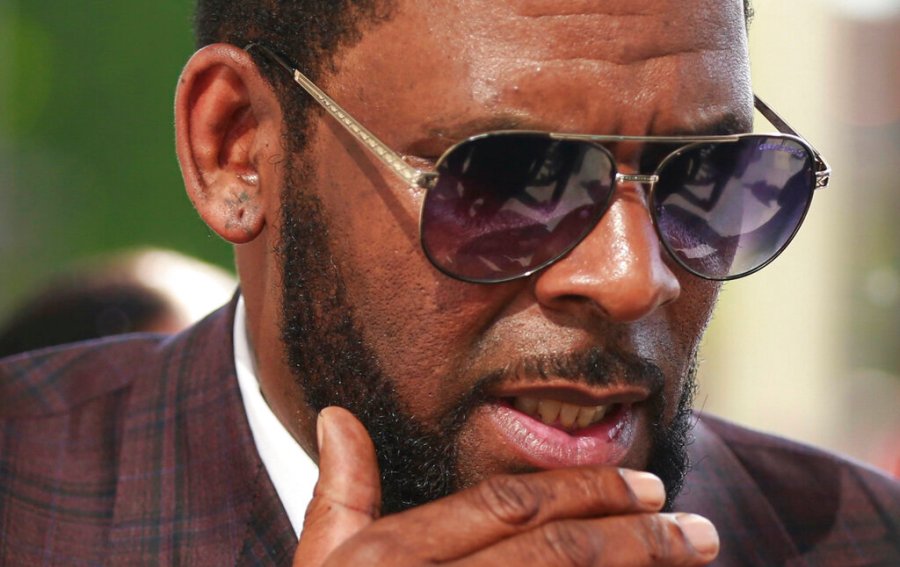 This photo from Wednesday June 26, 2019, shows R&B singer R. Kelly arriving at the Leighton Criminal Court in Chicago for arraignment on sex-related charges. (AP Photo/Amr Alfiky, File)