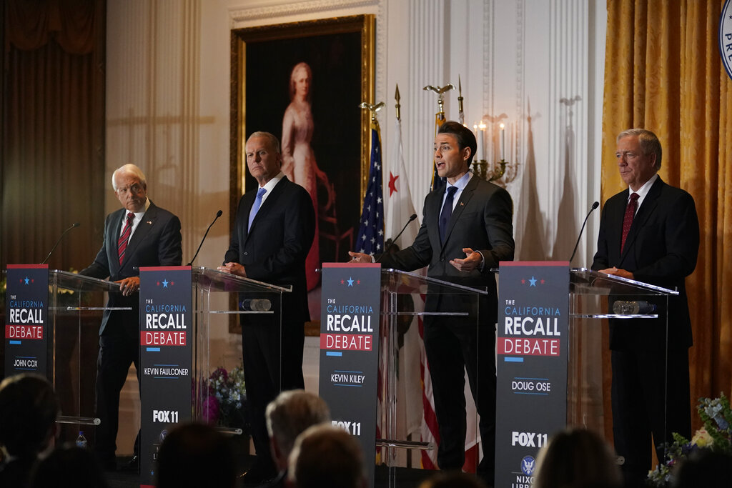 From left, Republican candidates for California Governor John Cox, Kevin Faulconer, Kevin Kiley and Doug Ose participate in a debate at the Richard Nixon Presidential Library Wednesday, Aug. 4, 2021, in Yorba Linda, Calif. (AP Photo/Marcio Jose Sanchez)