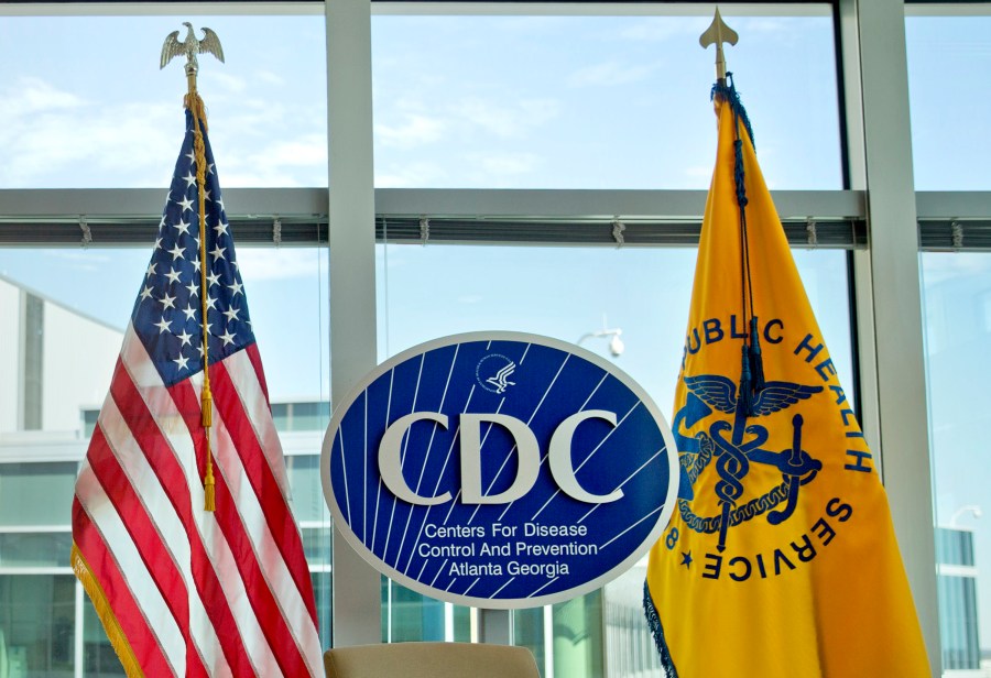 This Nov. 19, 2013 file photo shows a Centers for Disease Control and Prevention logo at the agency's federal headquarters in Atlanta. In a growing medical mystery, a person who died in July 2021 in Georgia has been confirmed as the fourth U.S. case this year of an illness caused by the meliodosis bacteria from South Asia. On Monday, Aug. 9, 2021, the Centers for Disease Control and Prevention sent an alert about the latest case to U.S. doctors. (AP Photo/David Goldman, File)