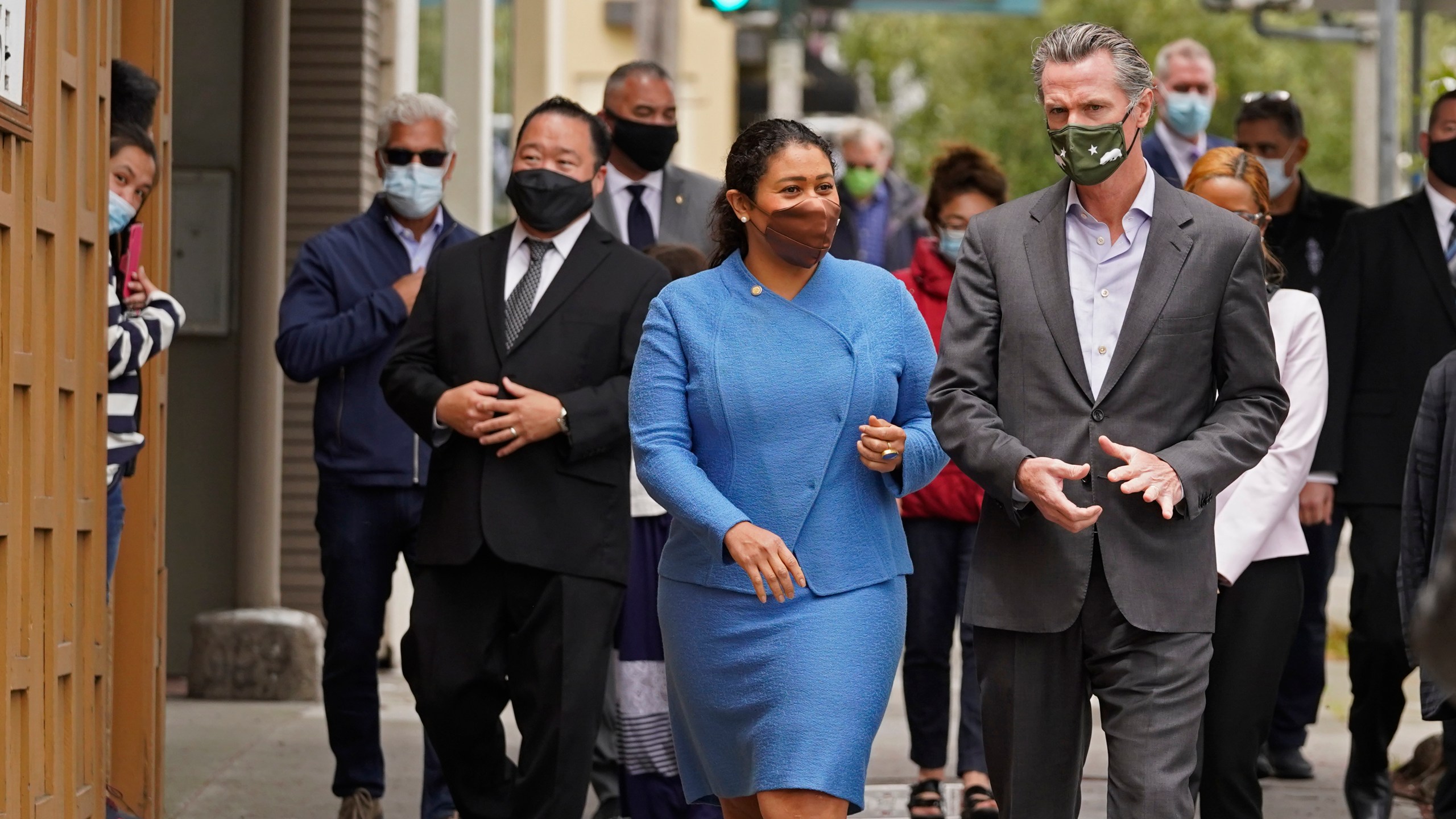 In this June 3, 2021 file photo California Gov. Gavin Newsom walks with San Francisco Mayor London Breed on Geary Street to a news conference outside Tommy's Mexican Restaurant in San Francisco. (Eric Risberg/Associated Press)