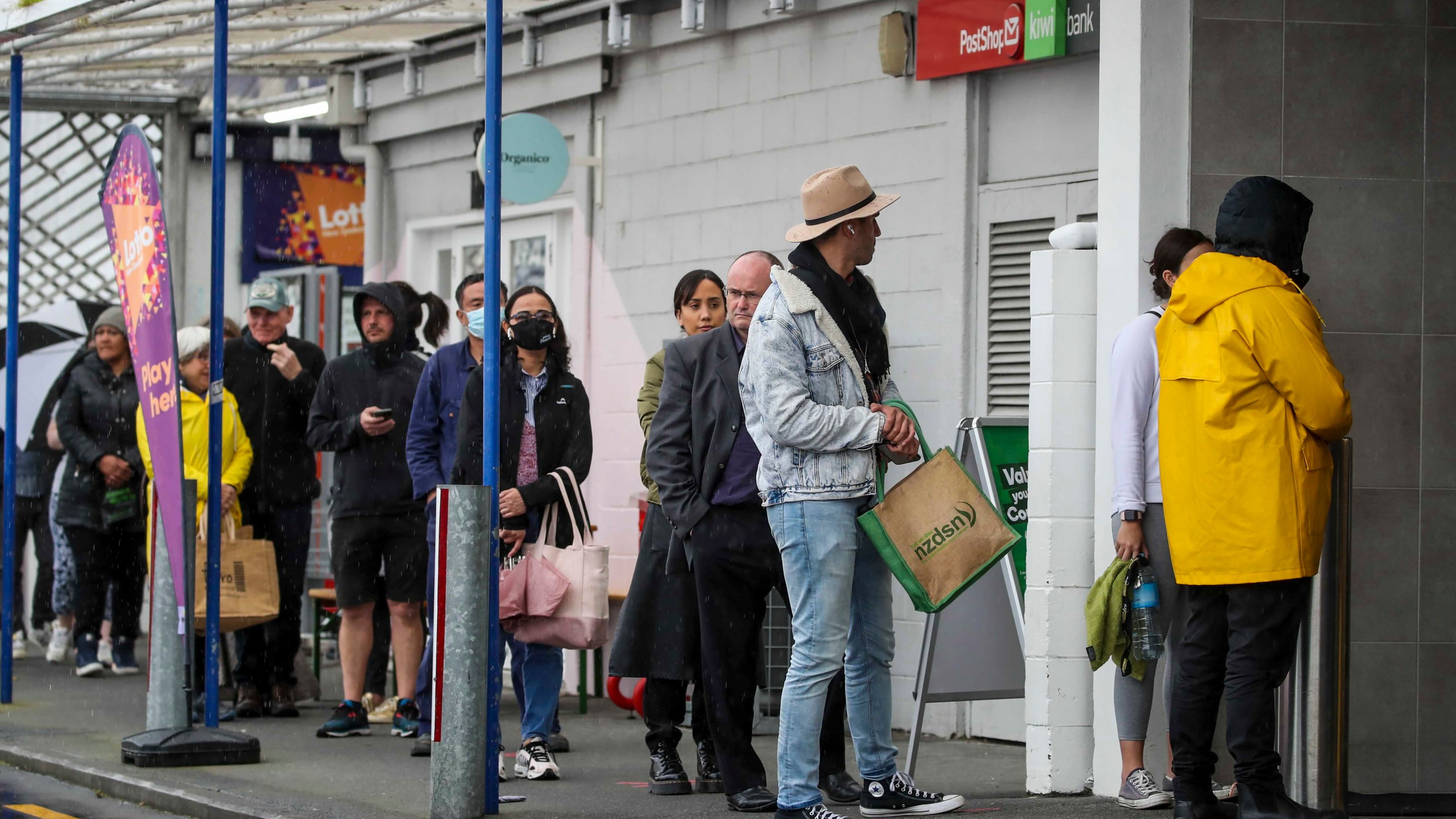 New Zealand's government took drastic action Tuesday by putting the entire nation into a strict lockdown for at least three days after finding a single case of coronavirus infection in the community. Prime Minister Jacinda Ardern invoked some of the stirring rhetoric she used early in the pandemic by urging the “team of 5 million” — New Zealand's population — to go hard and early in trying to eliminate the latest outbreak. "We have seen what happens elsewhere if we fail to get on top of it," Ardern said. “We only get one chance.” She said Auckland, where the infected man lives, and Coromandel, where he had visited, would go into a full lockdown for seven days and the remainder of the country for three days while health experts tried to find the source of his infection. The developments prompted people to line up outside supermarkets to stock up on essential items and sparked a sharp drop in the value of the New Zealand dollar. New Zealand had managed to stamp out the virus, and the last outbreak was in February. But Ardern had been warning that the contagiousness of the delta variant would likely require more drastic action than previous outbreaks. New Zealand has also been slower than other developed nations to inoculate its population, leaving it vulnerable to outbreaks. Only 32% of people have had at least one shot and 18% are fully vaccinated. And officials have been viewing a growing outbreak in nearby Sydney with alarm, saying they don't want to make the same mistakes by waiting too long to impose strict measures. Health officials said genome testing would not verify until Wednesday whether the infected 58-year-old man had the delta variant, although they were working under the assumption he does. Officials said they could not immediately find a connection between the man and the handful of people who have tested positive while isolating in quarantine after arriving from abroad. The border is seen as the most likely source of any outbreaks. The move into the strictest lockdown underscored the vastly different approach New Zealand has taken to the virus than most other nations, which are attempting to suppress its spread rather than eliminate it entirely. New Zealand has reported just 26 virus deaths since the pandemic began. The lockdown takes effect from just before midnight Tuesday. It requires people to remain at home and avoid others. Most people can leave only to buy groceries or exercise. The nation's vaccination program had been accelerating but has been suspended for two days due to the outbreak.