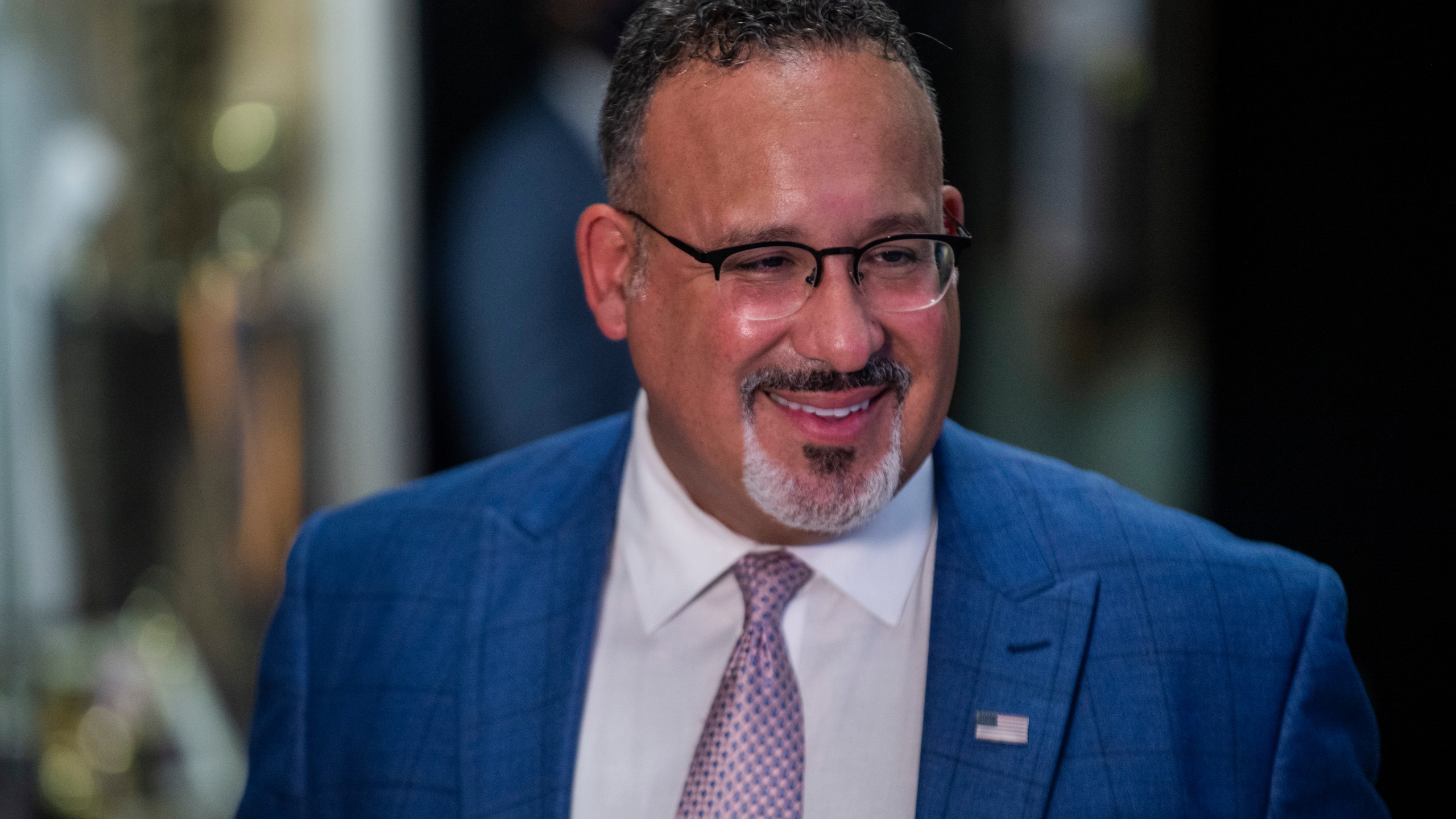 Education Secretary Miguel Cardona speaks to press after a visit to P.S. 5 Port Morris, a Bronx elementary school, Tuesday, Aug. 17, 2021 in New York. (AP Photo/Brittainy Newman)