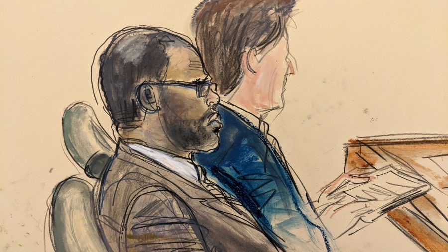 In this courtroom artist's sketch made from a video screen monitor of a Brooklyn courtroom, defendant R. Kelly, left, listens during the opening day of his trial on Aug. 18, 2021, in New York. (Elizabeth Williams / Associated Press)