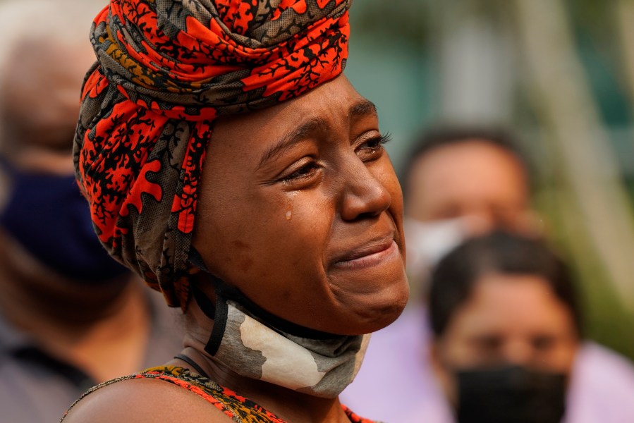 A tear streams down Nakia Porter’s cheek during a news conference in Sacramento to announce the filing of a federal lawsuit she has brought against two Solano County Sheriff's deputies on Aug. 18, 2021. (Rich Pedroncelli / Associated Press)