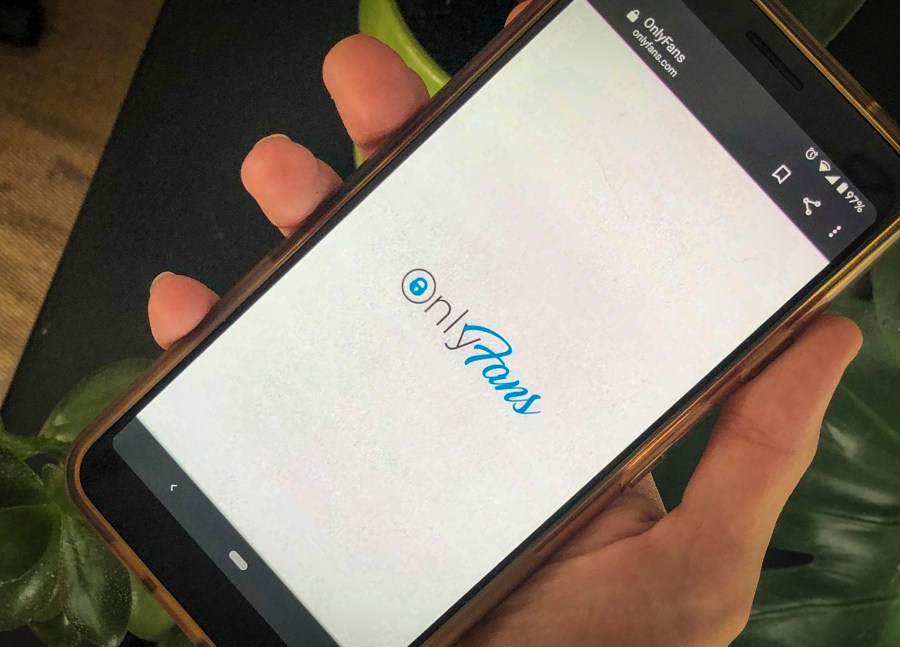 This photo shows a phone app for OnlyFans, a site where fans pay creators for their photos and videos, Thursday Aug. 19, 2021. OnlyFans says it has “suspended” a plan to ban sexually explicit content following an outcry from its creators and advocates for sex workers. The company tweeted Wednesday, Aug. 25, 2021 that it had “secured assurances necessary to support our diverse creator community” and will “continue to provide a home for all creators.” (AP Photo/Tali Arbel, file)