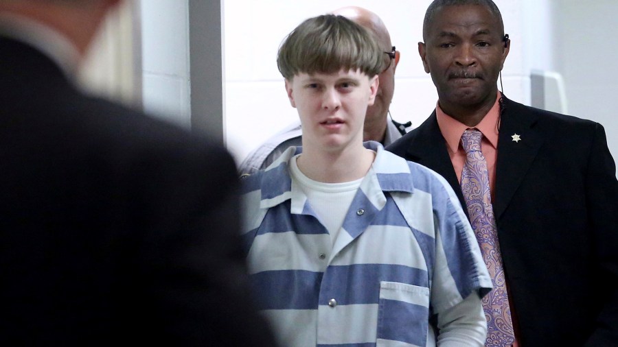 In this April 10, 2017, file photo, Dylann Roof enters the courtroom at the Charleston County Judicial Center to enter his guilty plea on murder charges in Charleston, S.C. (Grace Beahm/The Post And Courier via Associated Press, Pool)