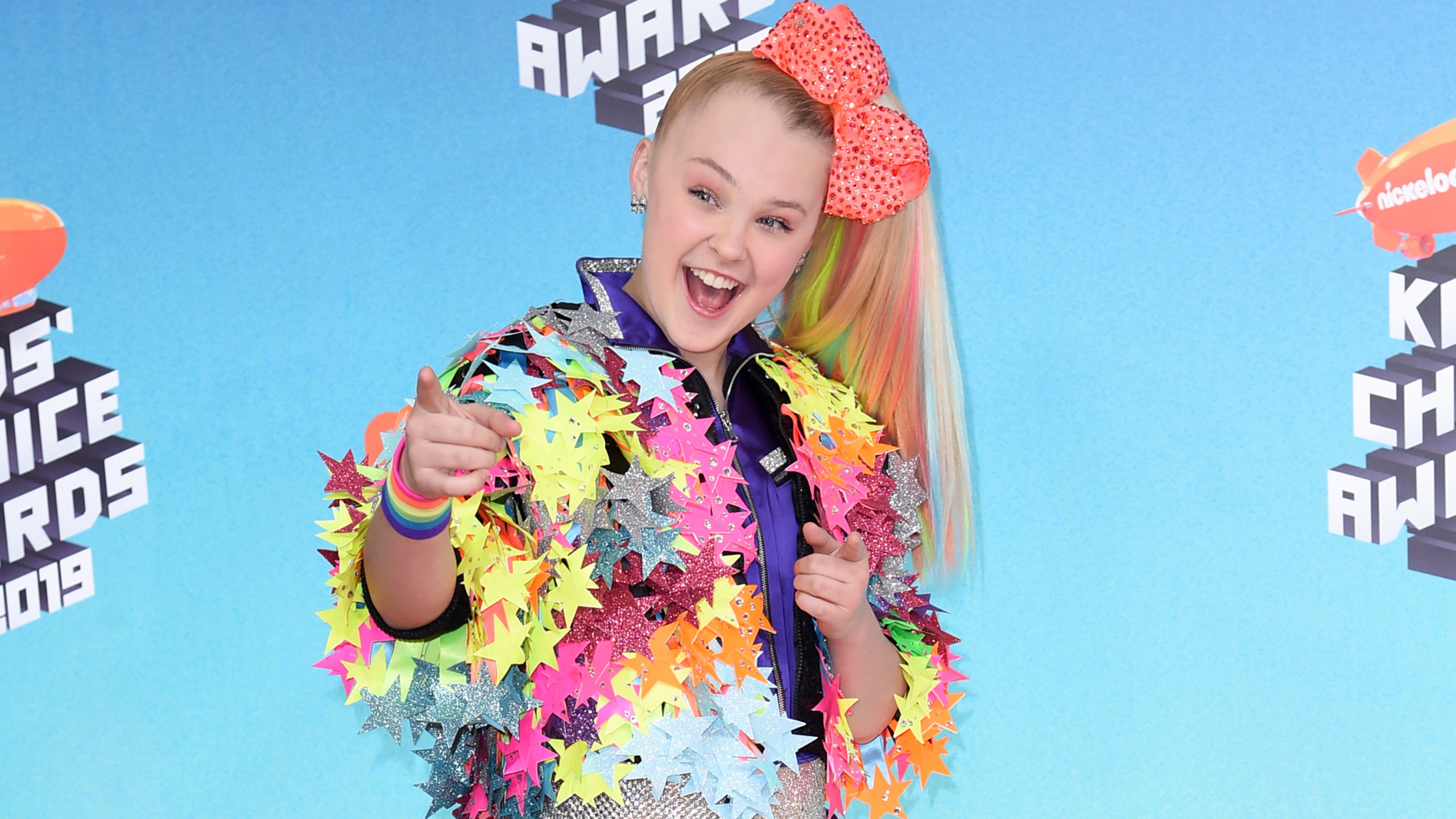 JoJo Siwa arrives at the Nickelodeon Kids' Choice Awards on March 23, 2019, In Los Angeles. (Richard Shotwell/Invision/AP, File)