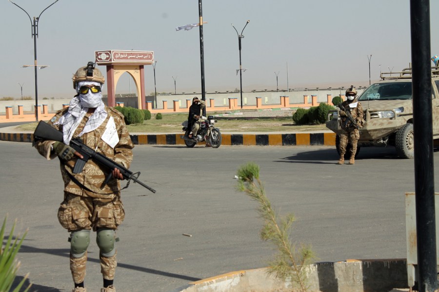 Taliban commando fighters stand guard in Lashkar Gah, Helmand province, southwestern, Afghanistan, Friday, Aug. 27, 2021. (AP Photo/Abdul Khaliq)