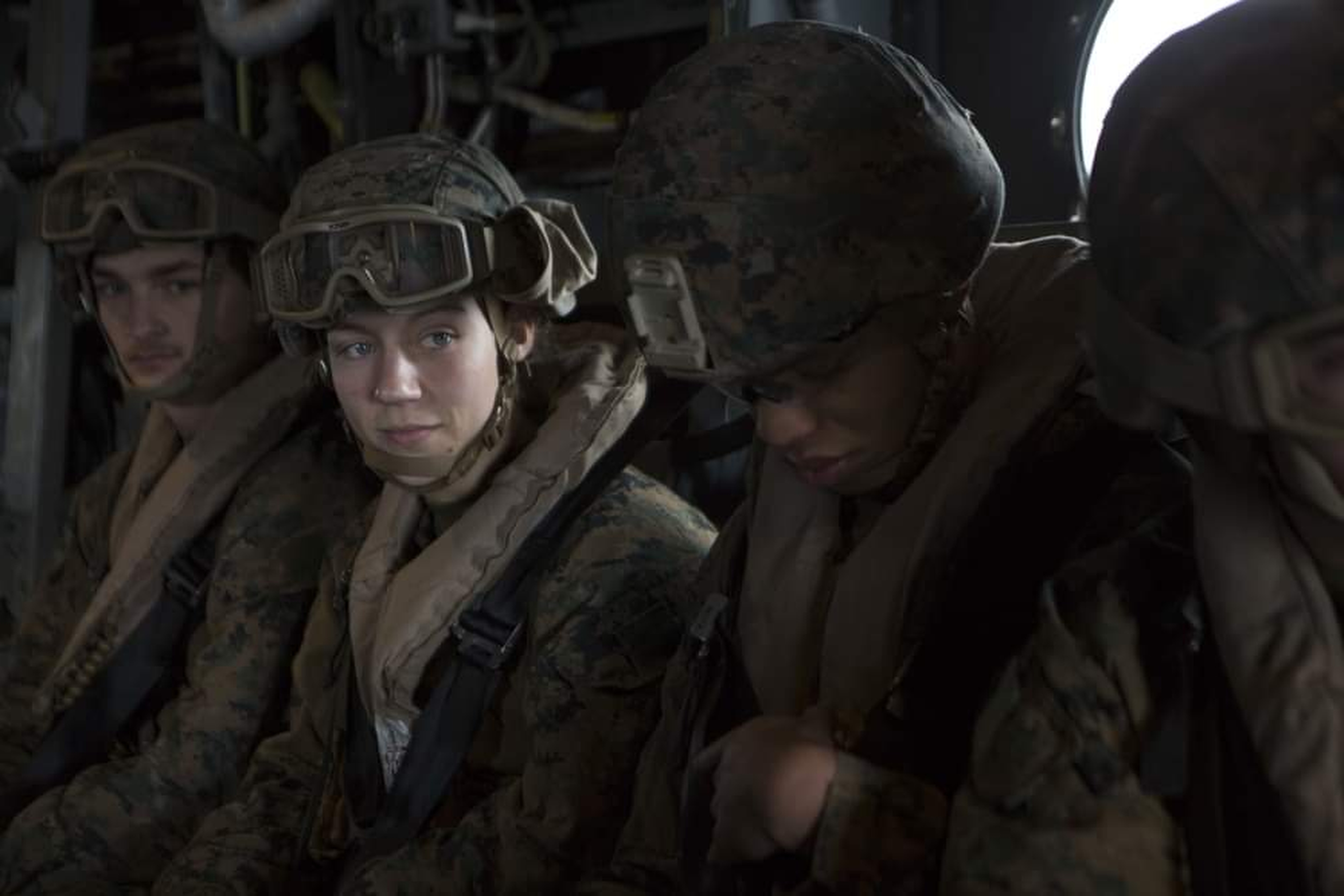 This Aug. 26, 2021, photo, released by U.S. Marine Corps/II Marine Expeditionary Force, shows U.S. Marine Corps Sgt. Nicole L. Gee, second from left, while supporting evacuation operations in Kabul, Kabul Province, Afghanistan. Sgt. Gee died following an attack near the Hamid Karzai International Airport in Kabul. Gee, 23, of Sacramento, California, was a maintenance technician with the 24th Marine Expeditionary Unit from Camp Lejeune in North Carolina. (U.S. Marine Corps/II Marine Expeditionary Force via AP)