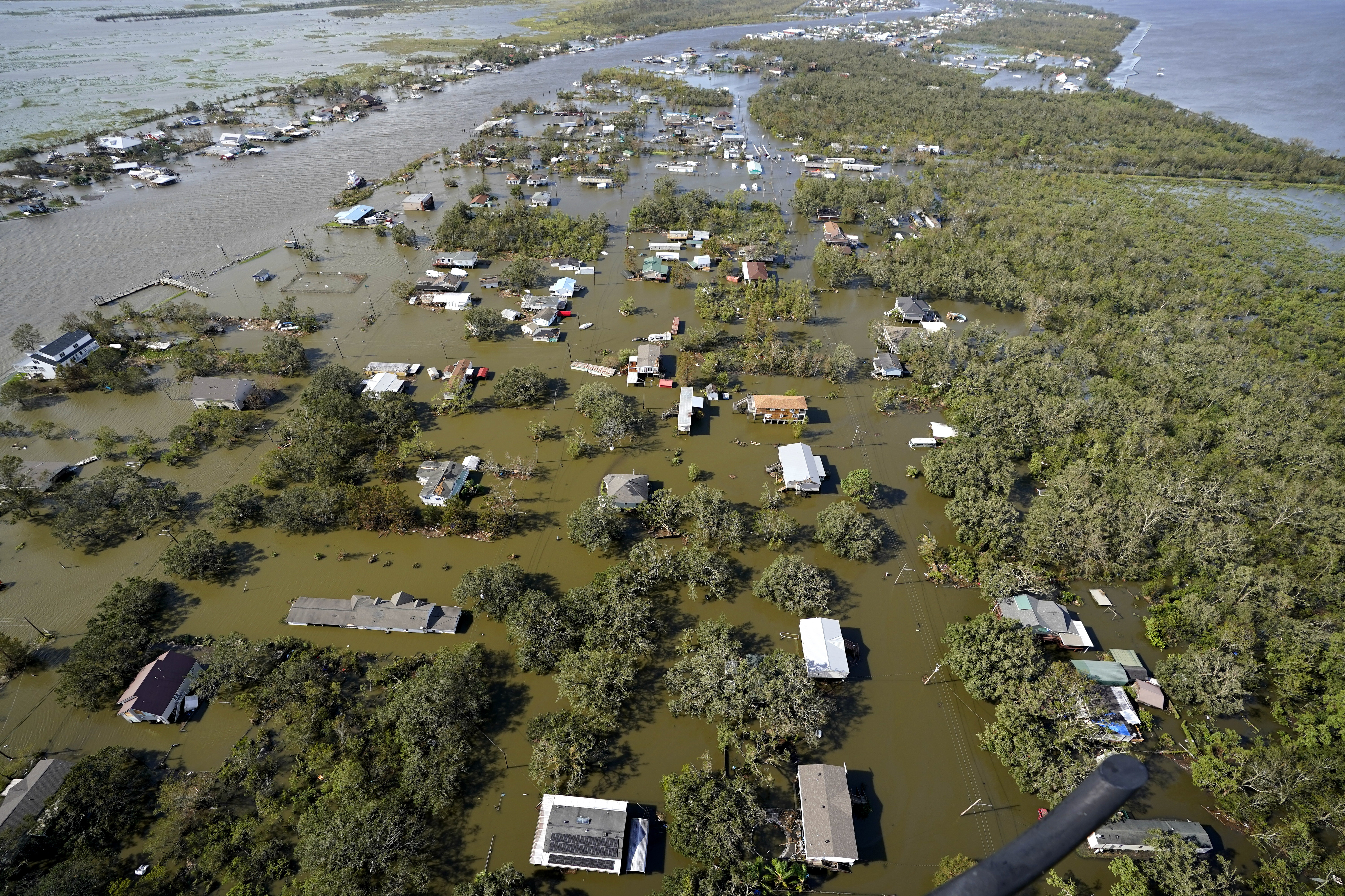 Homes are flooded in the aftermath of Hurricane Ida, Monday, Aug. 30, 2021, in Lafitte, La. The weather died down shortly before dawn. (AP Photo/David J. Phillip)