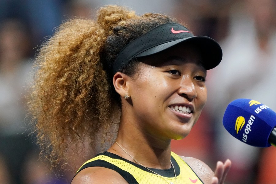 Naomi Osaka speaks to the crowd after beating Marie Bouzkova during the first round of the US Open tennis championships on Aug. 30, 2021, in New York. (AP Photo/Elise Amendola)