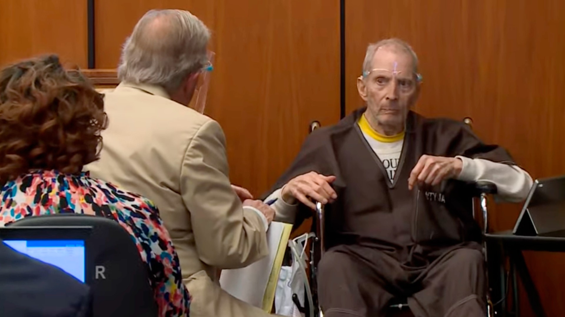 In this still image taken from the Law & Crime Network court video, real estate heir Robert Durst, right, describes what ailments he has to defense attorney Dick Deguerin during his murder trial on Monday, Aug. 9, 2021, in Los Angeles County Superior Court in Inglewood, Calif. (Law & Crime Network via AP, Pool)