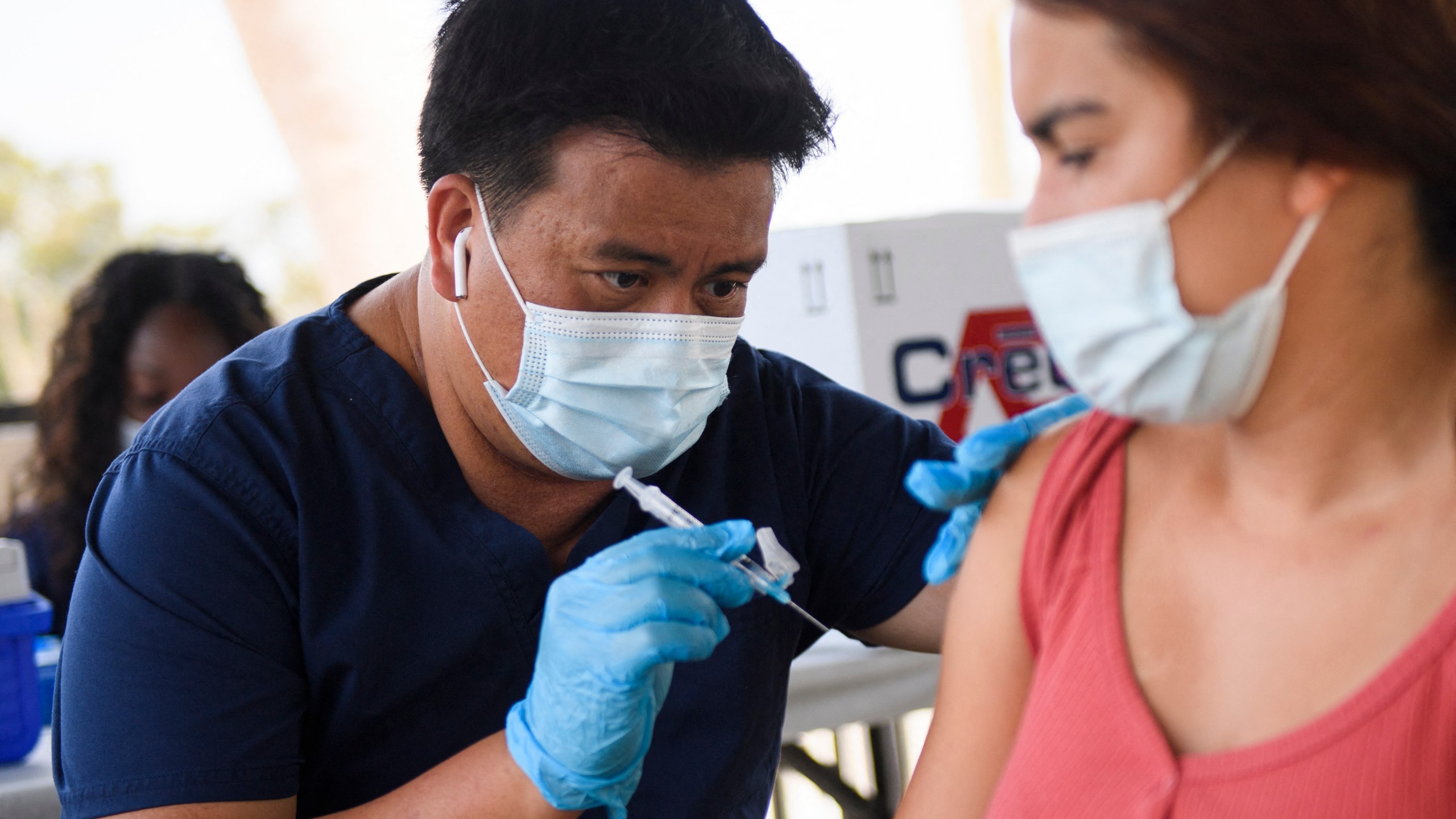 A student gets the COVID-19 vaccine at the California State University Long Beach campus on Aug. 11, 2021, in Long Beach. (PATRICK T. FALLON/AFP via Getty Images)