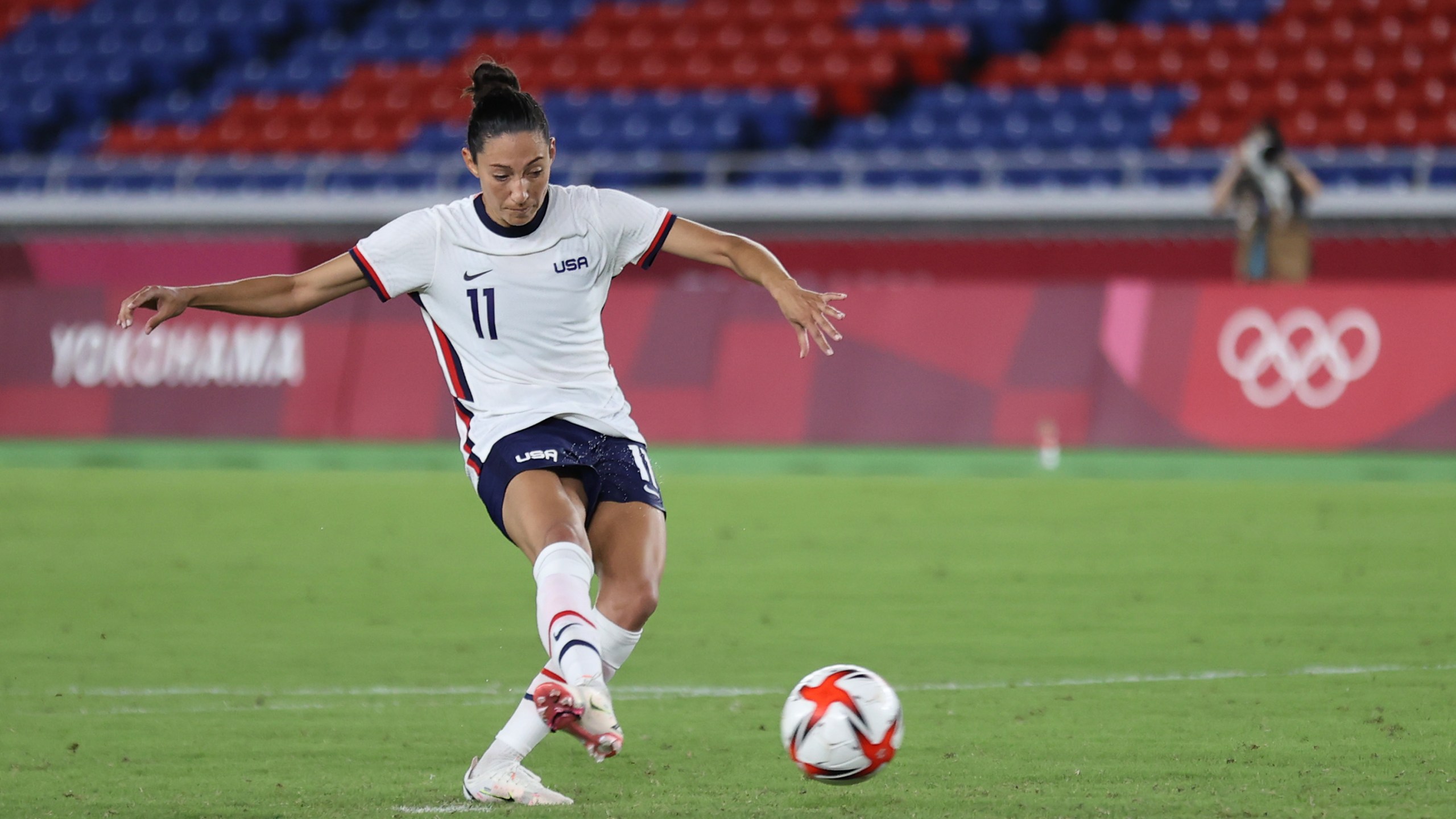 Christen Press of Team United States scores their team's third penalty in the penalty shoot out during the Women's Quarter Final match between Netherlands and United States on day seven of the Tokyo 2020 Olympic Games at International Stadium in Yokohama on July 30, 2021. (Griffiths/Getty Images)