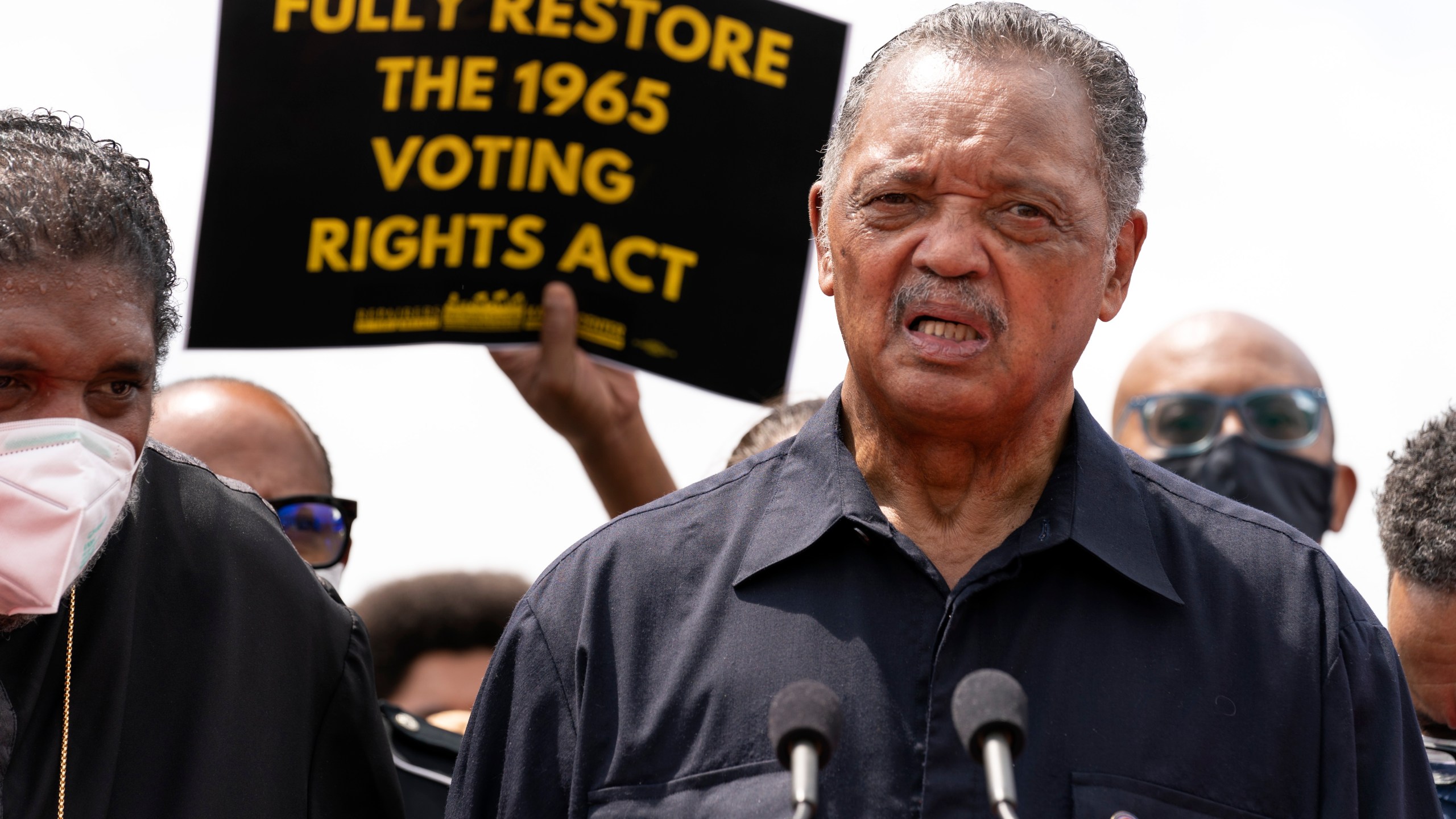 In this Monday, Aug. 2, 2021 file photo, Rev. Jesse Jackson speaks to the crowd during a demonstration supporting the voting rights, on Capitol Hill, in Washington. (AP Photo/Jose Luis Magana)