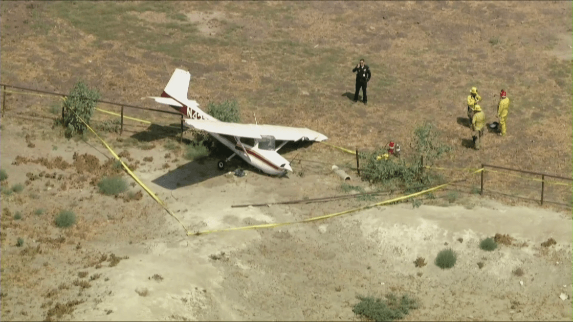 A plane landed in an empty dairy field in Ontario on Aug. 25, 2021. (KTLA)