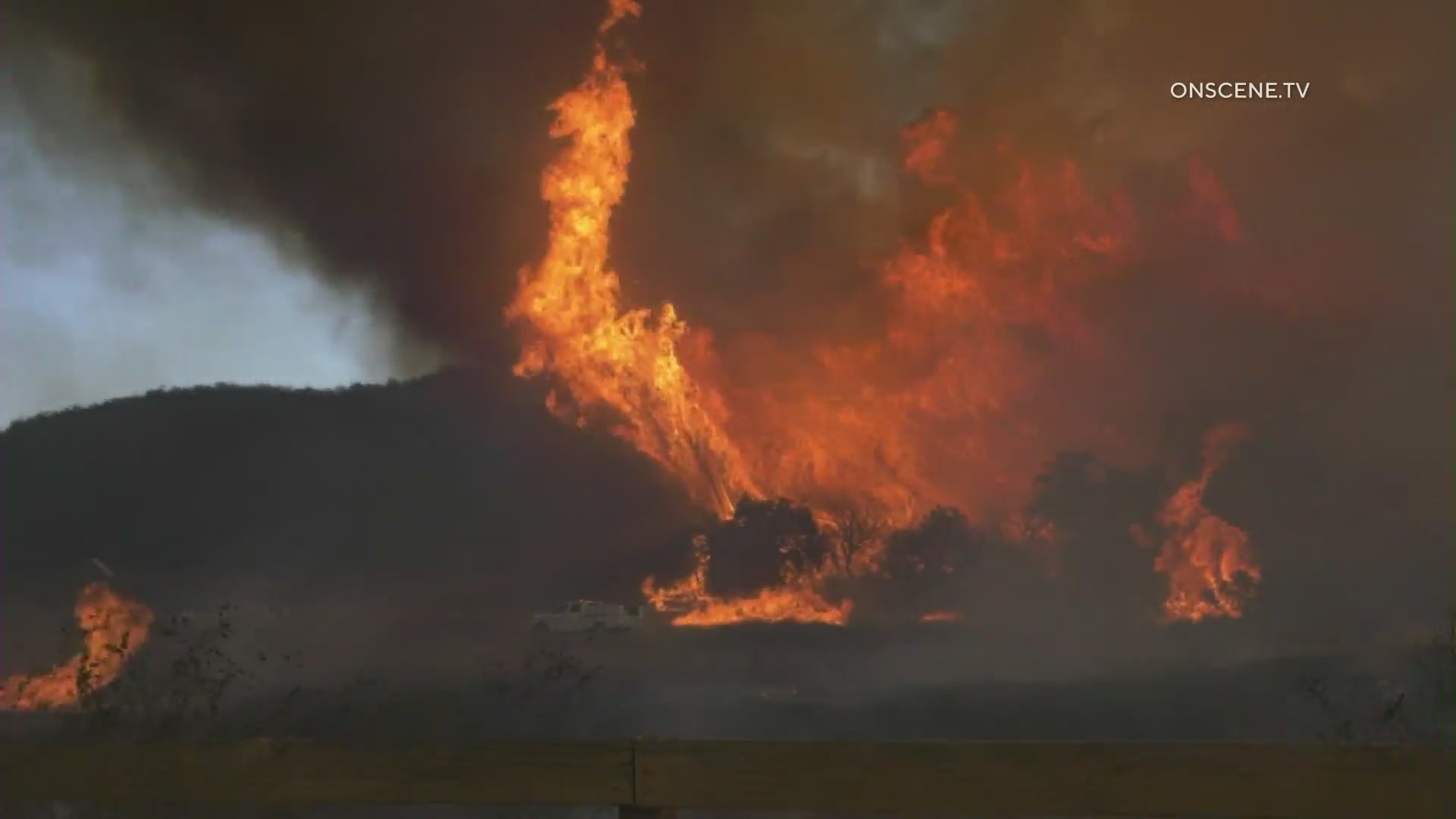 The Chapparal Fire can be seen burning near the edge of the Cleveland National Forest on Saturday, Aug. 28, 2021. (ONSCENE TV)