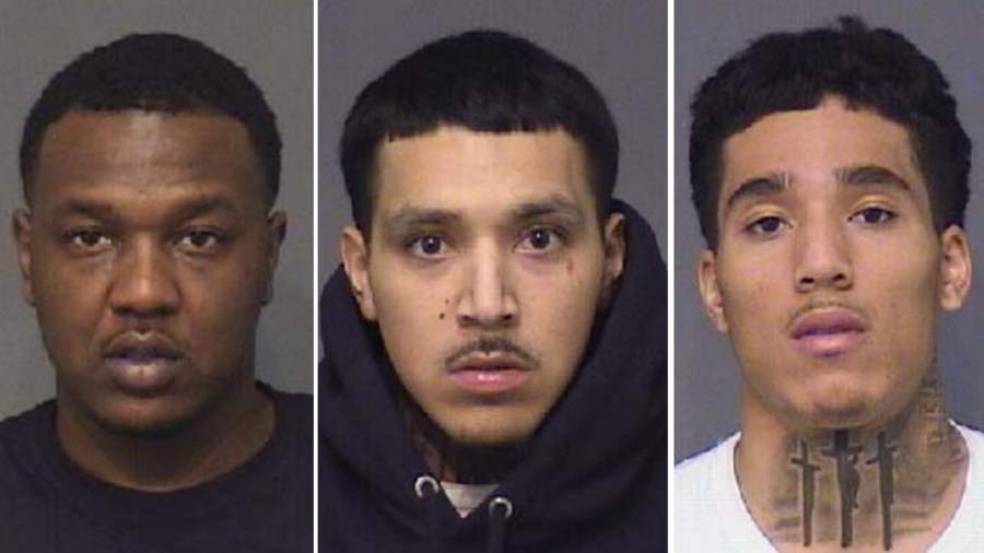 Kendrick West, Aaron Duran and Richard Hamilton are seen in booking photos released by Huntington Beach Police on Sept. 3, 2021.