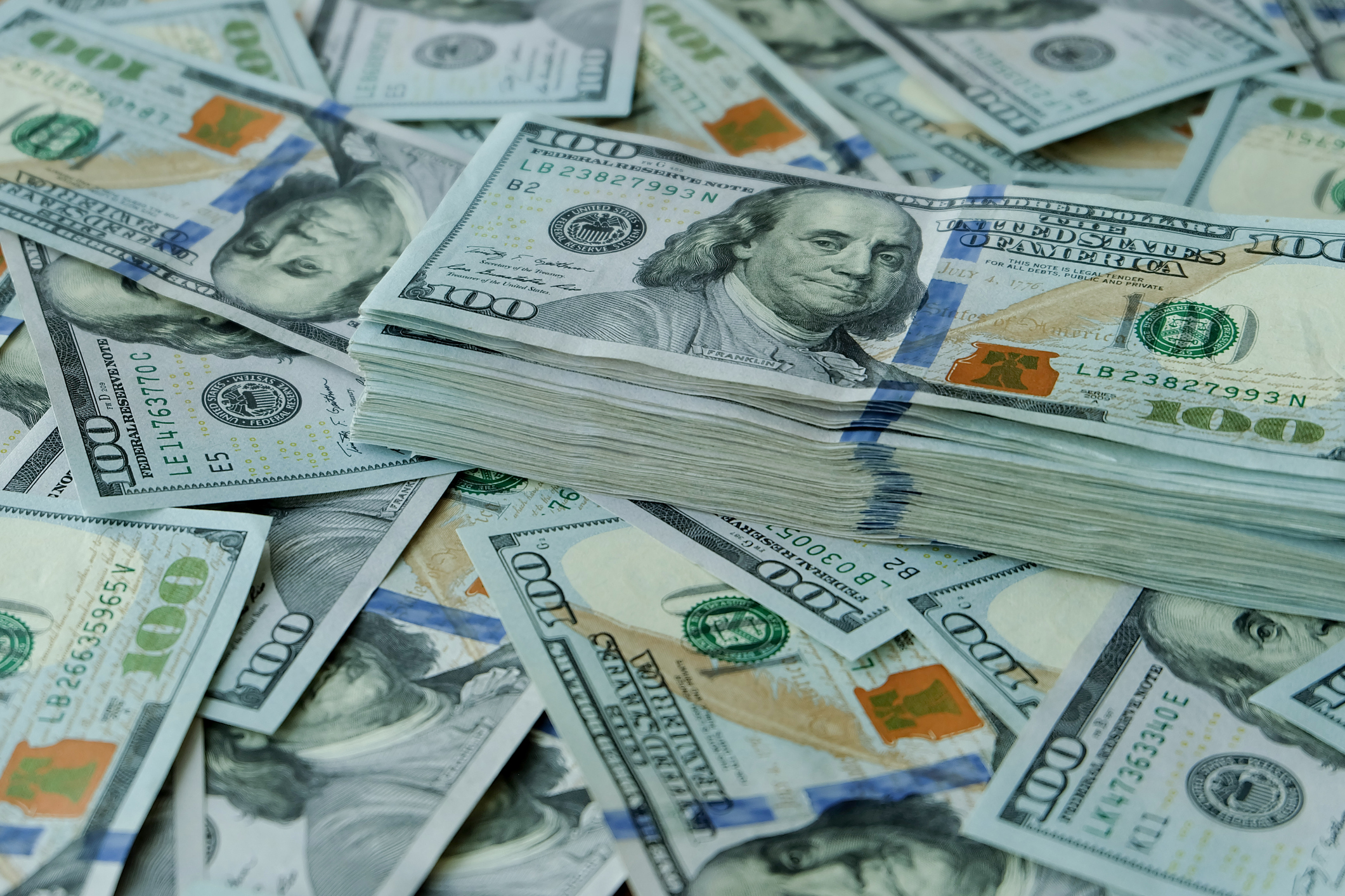 Stacks of cash are seen in a file photo. (iStock/ Getty Images Plus)