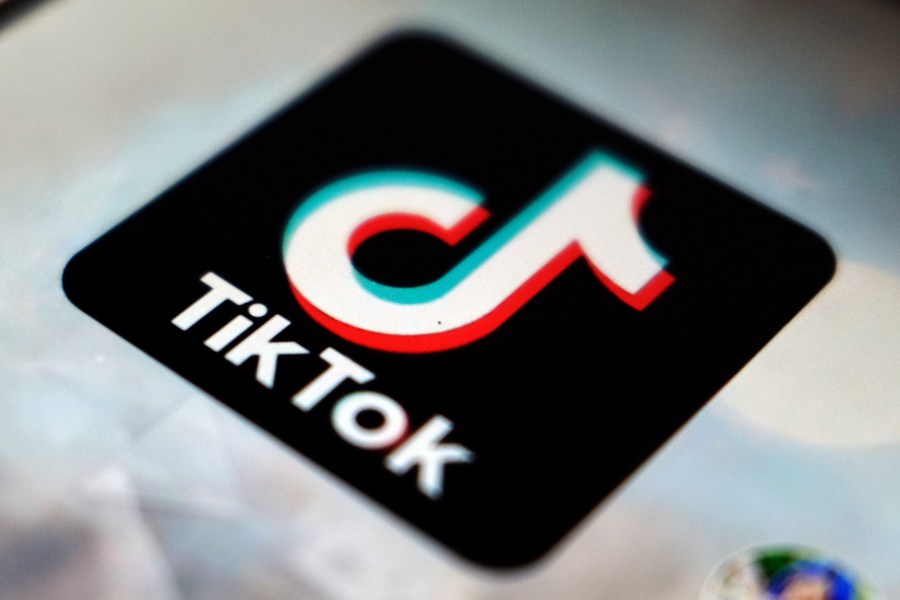 In this Sept. 28, 2020 filer, a logo of a smartphone app TikTok is seen on a user post on a smartphone screen, in Tokyo. (AP Photo/Kiichiro Sato, File)