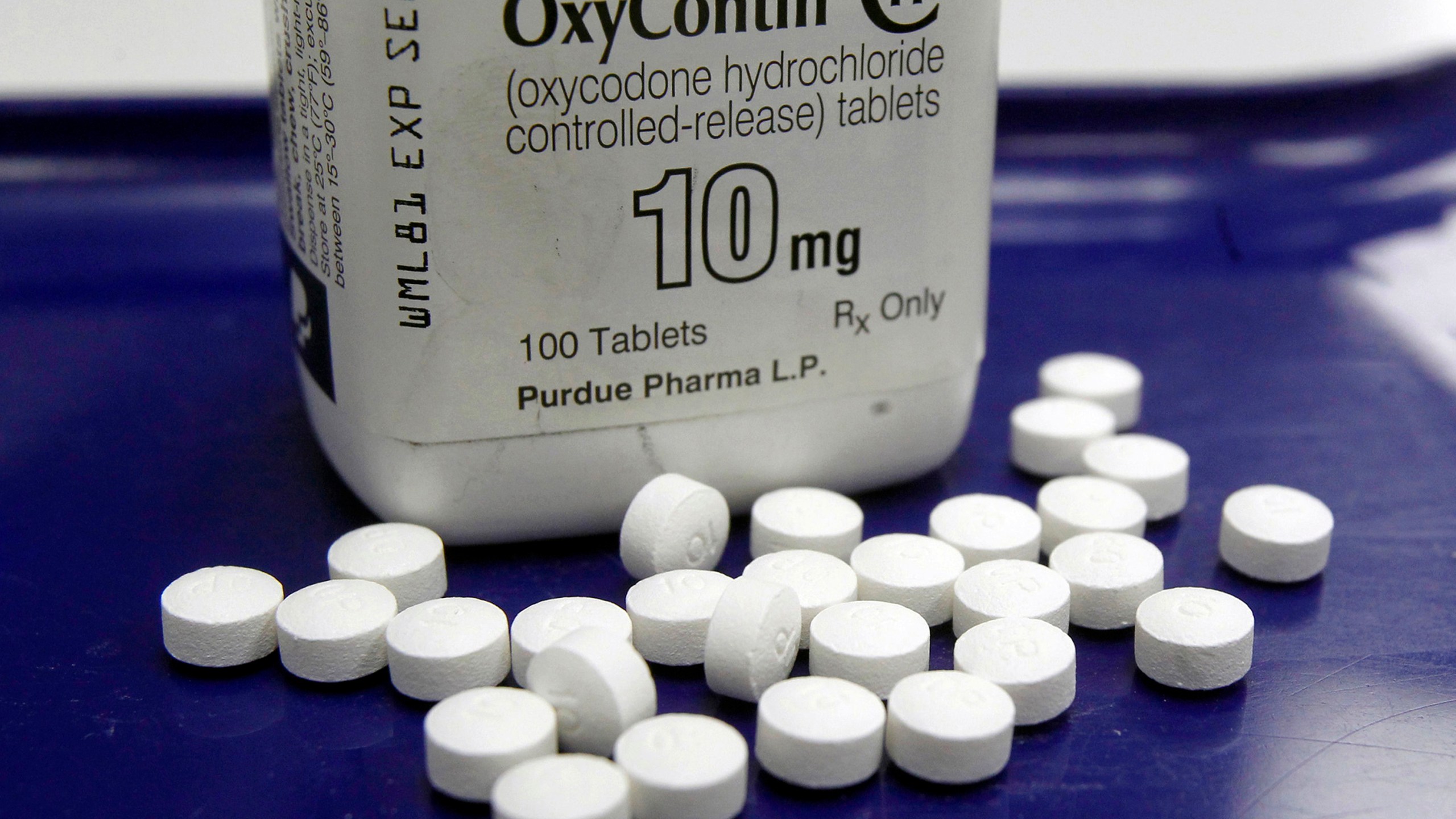 This Feb. 19, 2013, file photo shows OxyContin pills arranged for a photo at a pharmacy in Montpelier, Vt. A federal bankruptcy judge on Wednesday, Sept. 1, 2021, gave conditional approval to a sweeping, potentially $10 billion plan submitted by OxyContin maker Purdue Pharma to settle a mountain of lawsuits over its role in the opioid crisis that has killed a half-million Americans over the past two decades. (AP Photo/Toby Talbot, File)