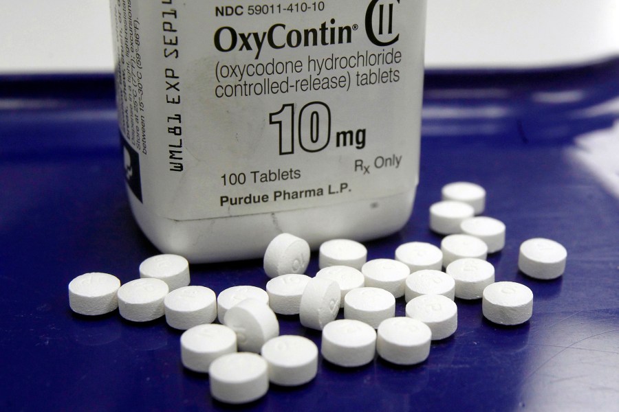 This Feb. 19, 2013, file photo shows OxyContin pills arranged for a photo at a pharmacy in Montpelier, Vt. A federal bankruptcy judge on Wednesday, Sept. 1, 2021, gave conditional approval to a sweeping, potentially $10 billion plan submitted by OxyContin maker Purdue Pharma to settle a mountain of lawsuits over its role in the opioid crisis that has killed a half-million Americans over the past two decades. (AP Photo/Toby Talbot, File)