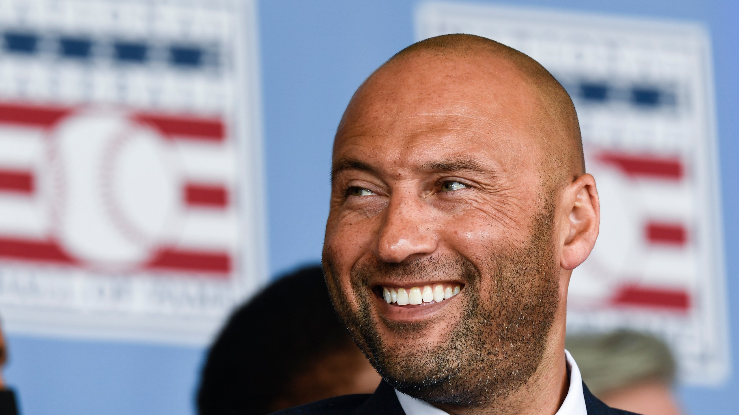 Hall of Fame inductee Derek Jeter, of the New York Yankees, watches a video during an induction ceremony at the Clark Sports Center at the National Baseball Hall of Fame in Cooperstown, N.Y. on Sept. 8, 2021. (Hans Pennink/Associated Press)