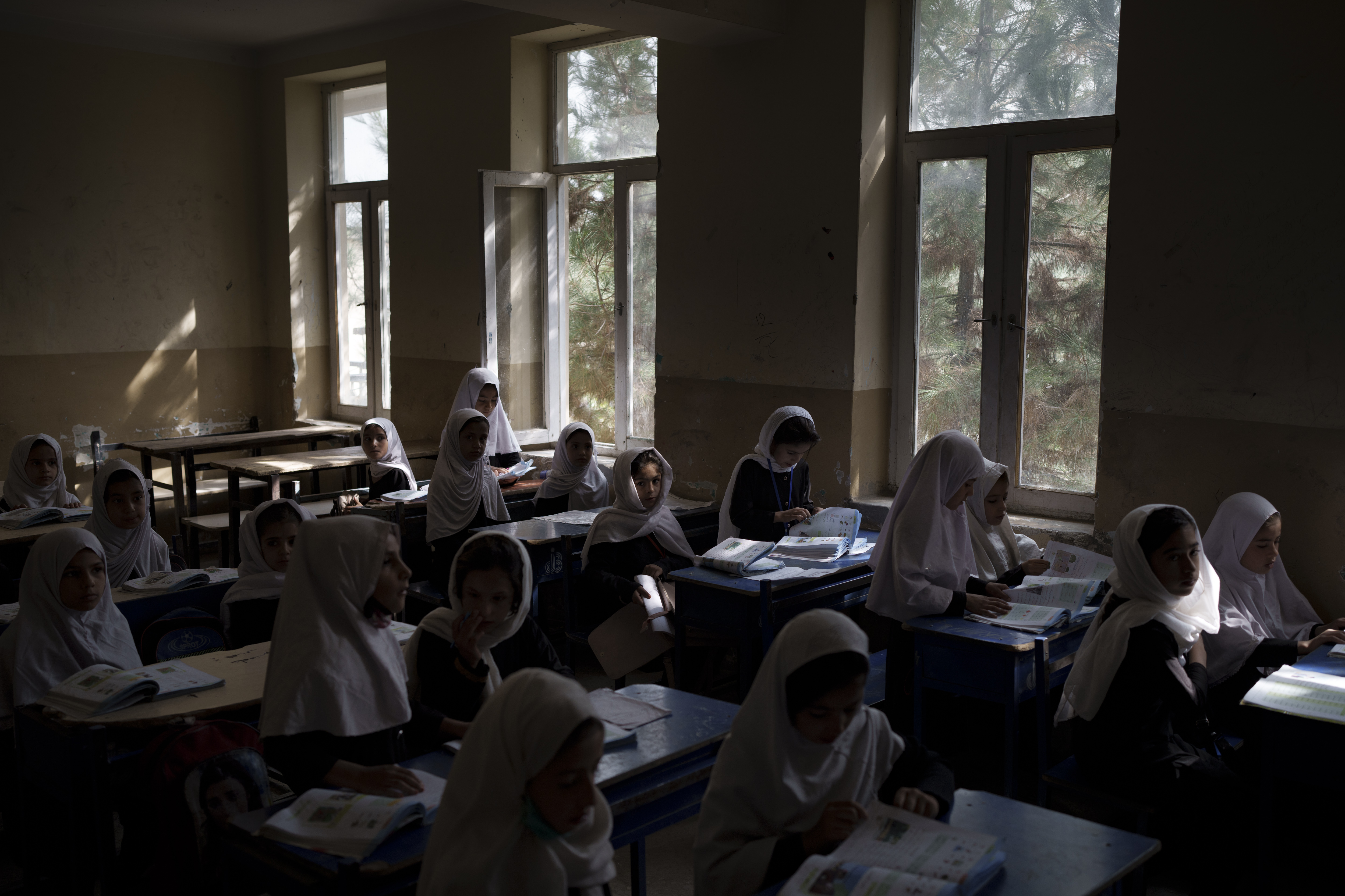 Girls prepare for class at a school in Kabul, Afghanistan, Sunday, Sept. 12, 2021. (AP Photo/Felipe Dana)Girls prepare for class at a school in Kabul, Afghanistan, Sunday, Sept. 12, 2021. (AP Photo/Felipe Dana)