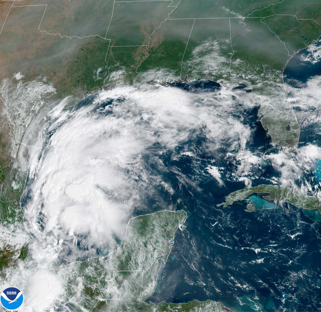 This satellite image provided by NOAA shows Tropical Storm Nicholas in the Gulf of Mexico on Sunday, Sept. 12, 2021. (NOAA via AP)