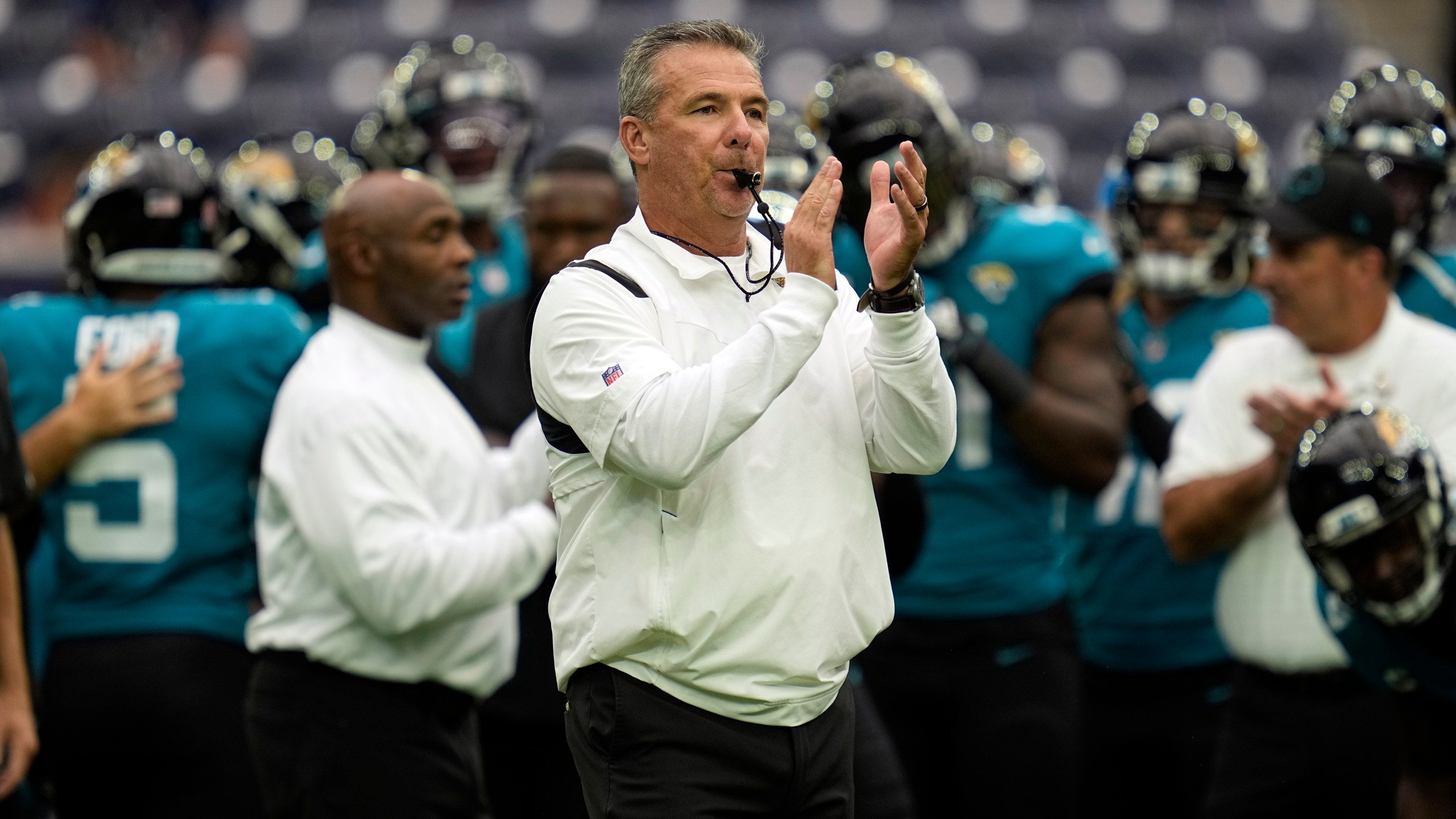 Jacksonville Jaguars coach Urban Meyer blows his whistle before an NFL football game against the Houston Texans Sunday, Sept. 12, 2021, in Houston. (AP Photo/Sam Craft)