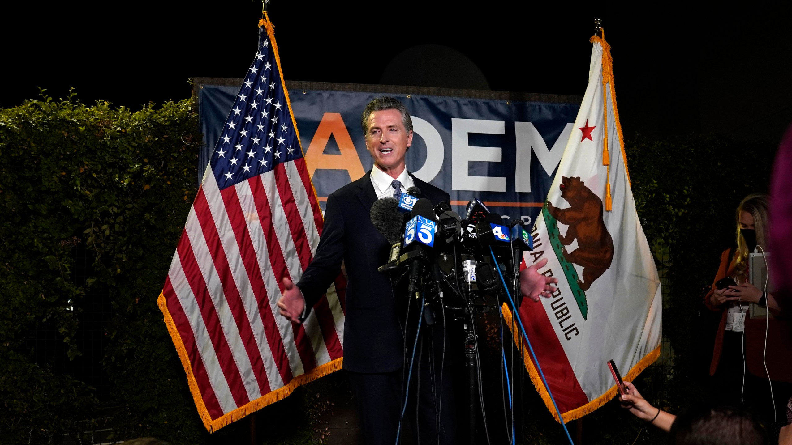 California Gov. Gavin Newsom addresses reporters after beating back the recall attempt that aimed to remove him from office, at the John L. Burton California Democratic Party headquarters in Sacramento, Calif., Tuesday, Sept. 14, 2021. (AP Photo/Rich Pedroncelli)