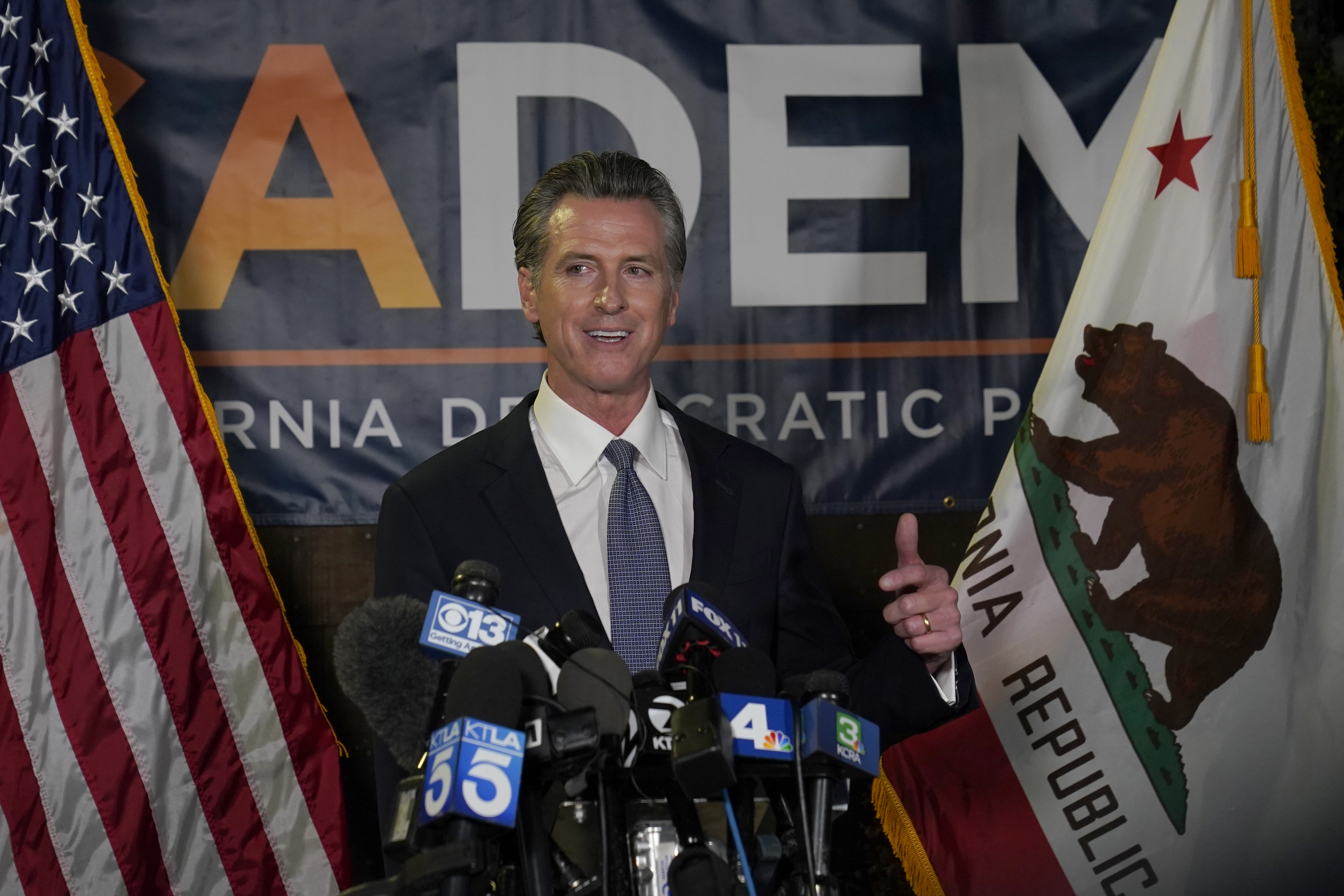 California Gov. Gavin Newsom addresses reporters at the California Democratic Party headquarters in Sacramento after beating back the recall attempt that aimed to remove him from office on Sept. 14, 2021. (Rich Pedroncelli / Associated Press)